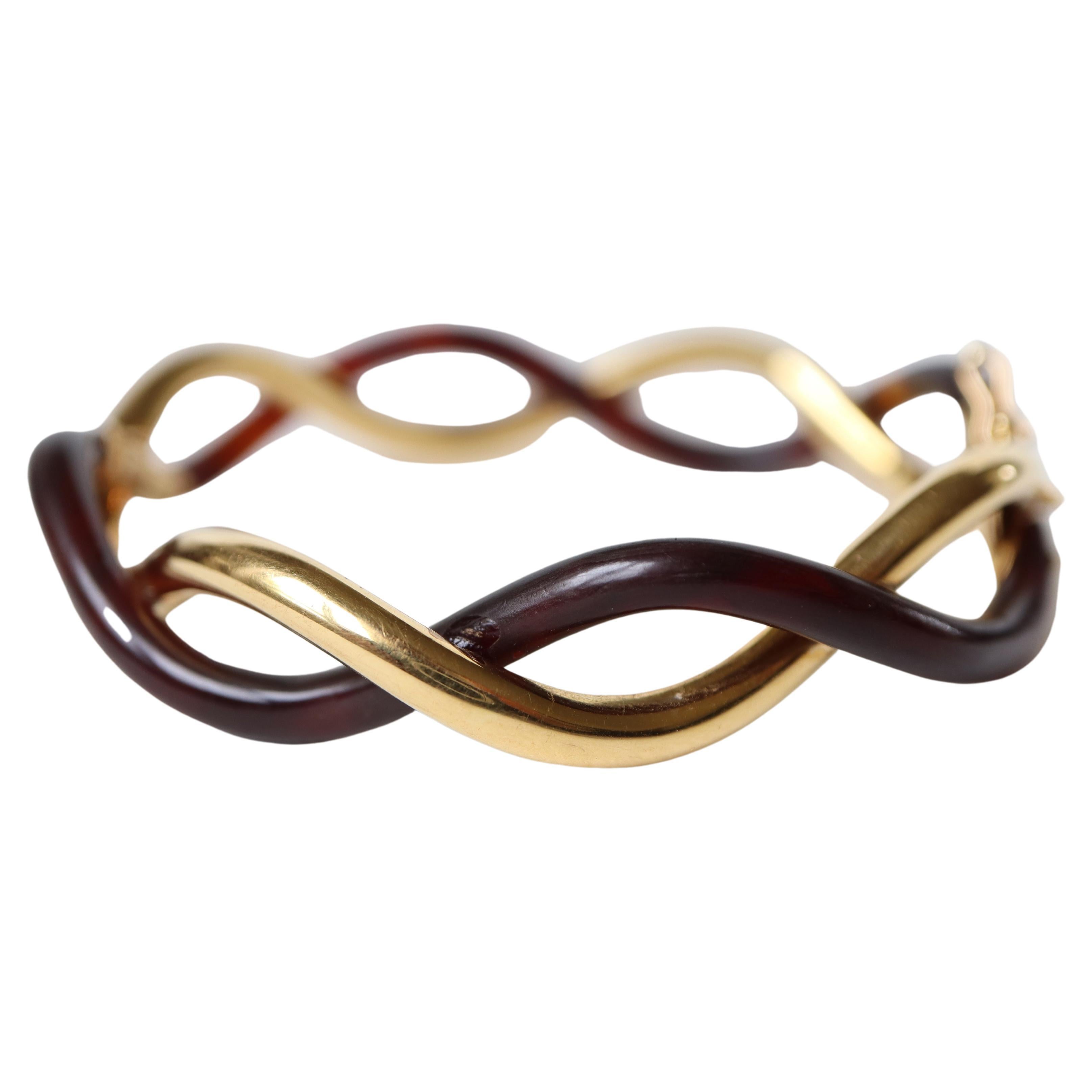 Boucheron Bracelet in 18 Carats Yellow Gold and Tortoise Shell For Sale