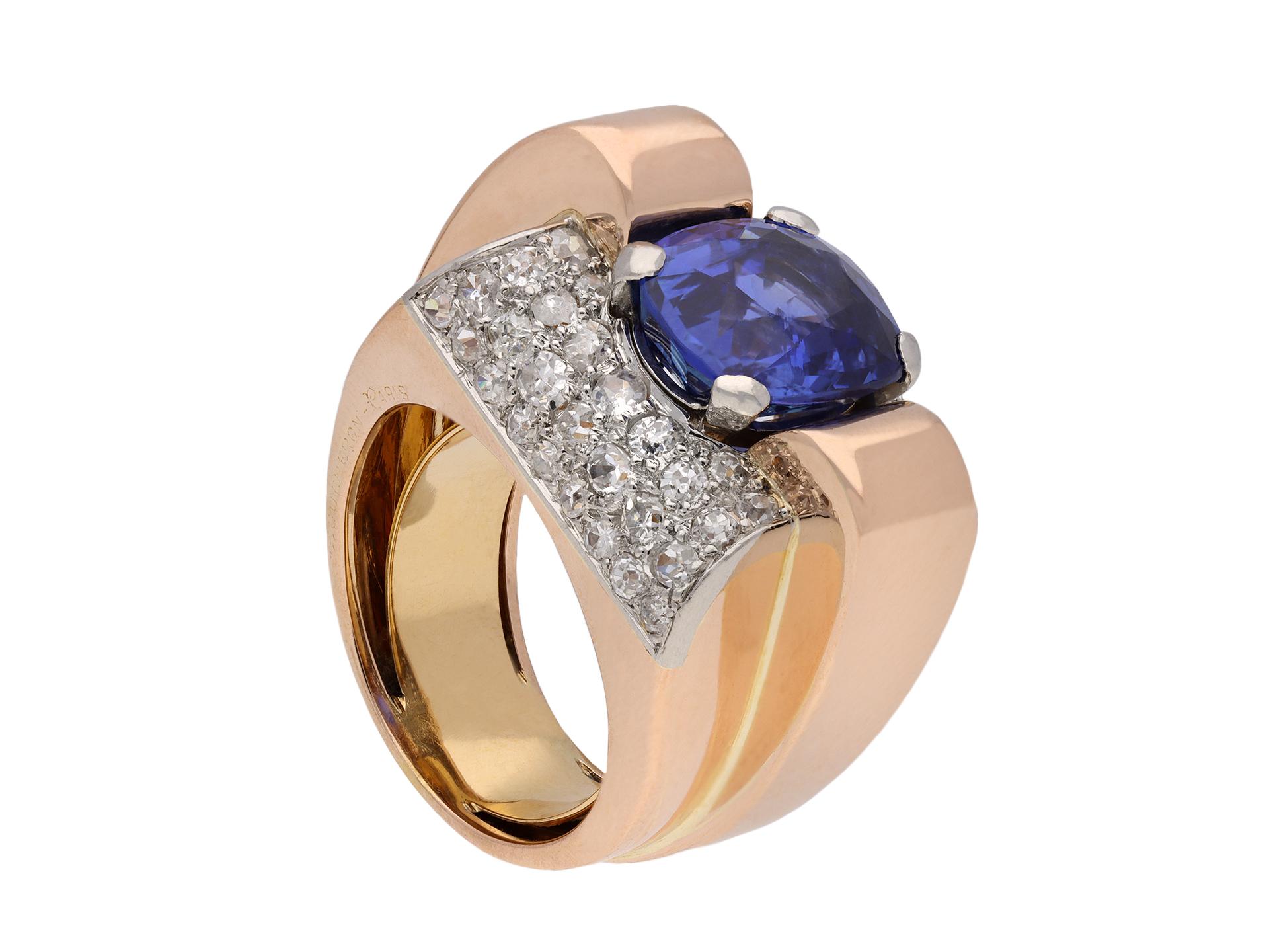 Boucheron Ceylon sapphire and diamond cocktail ring. Set to centre with a cushion shape old cut natural unenhanced Ceylon sapphire in an open back claw setting with a weight of 4.86 carats, further adorned by 54 round eight cut diamonds in open back
