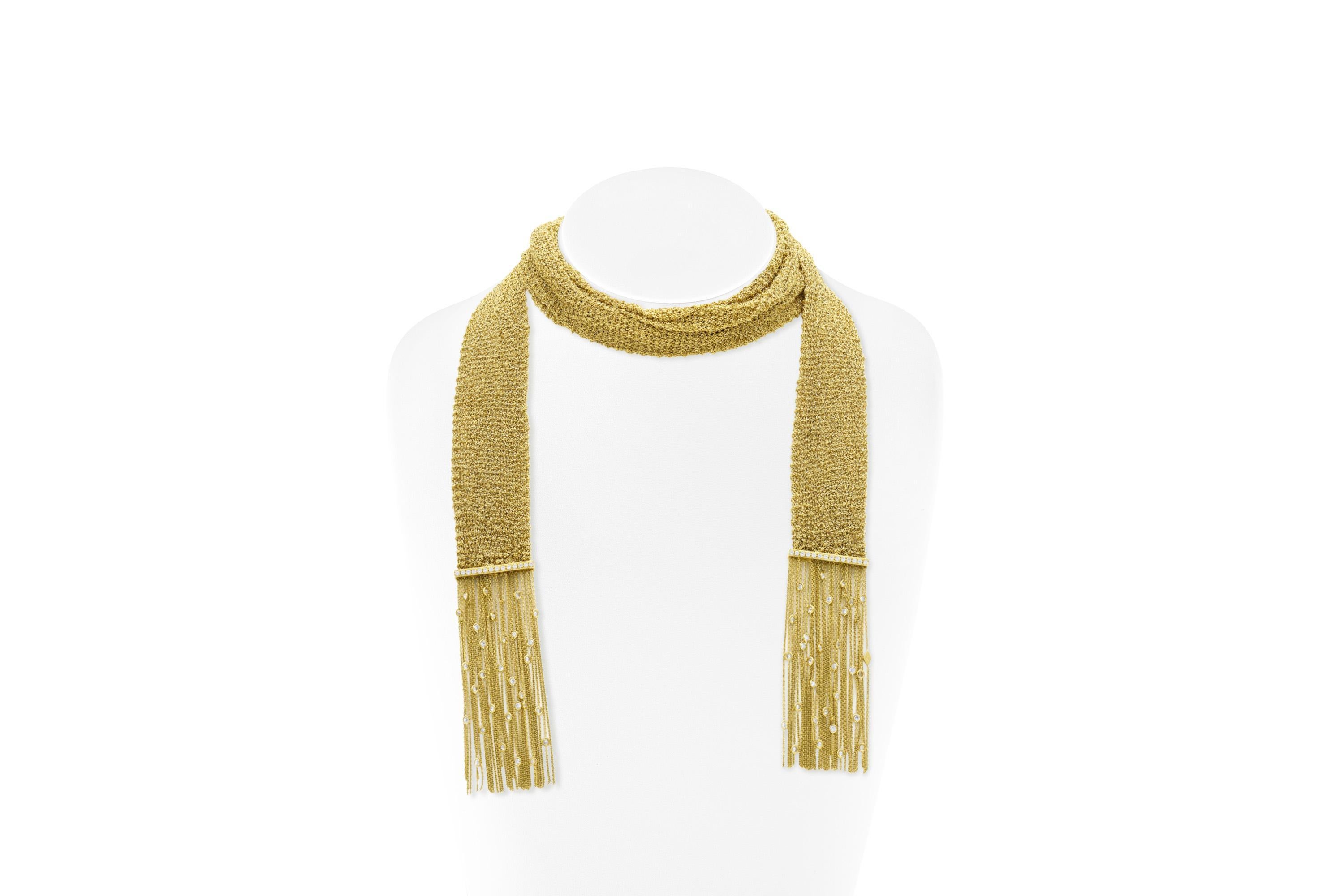 Finely crafted in 18k mesh yellow gold with Round Brilliant cut Diamonds.
Signed by Boucheron
Circa 2000s
Scarf Necklace: 41 inches long with an additional 6 inches of fringe on the ends, 209.3g
Bracelet: 7 inches long with and additional 1 1/4