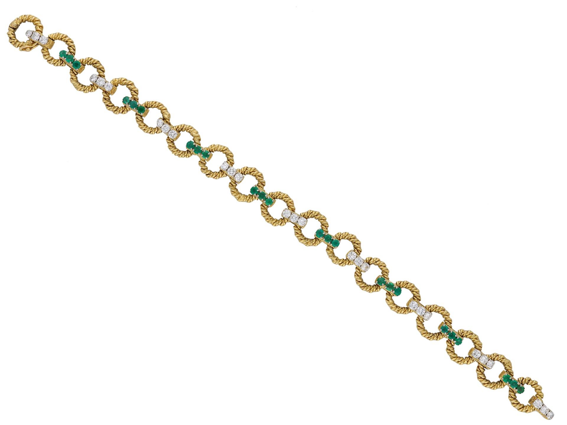 Boucheron diamond and emerald bracelet. A yellow gold bracelet set with twenty-seven round transitional cut diamonds in closed back claw settings with a combined approximate weight of 1.62 carats, further set with twenty-four round mixed cut natural
