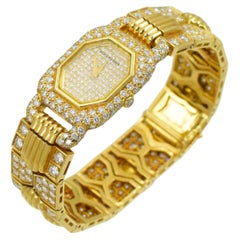 Montre en or et diamants Boucheron