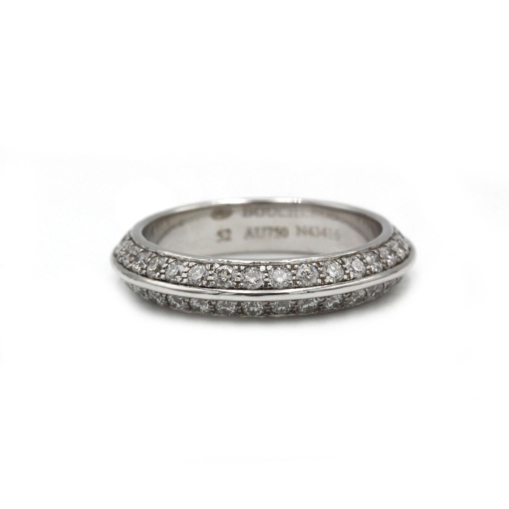 Signed Boucheron double-band diamond ring in 18K white gold, numbered and hallmarked. This refined design presents two closely matched pavé rows separated by a polished channel, producing an elegant, low-profile eternity effect without being overly