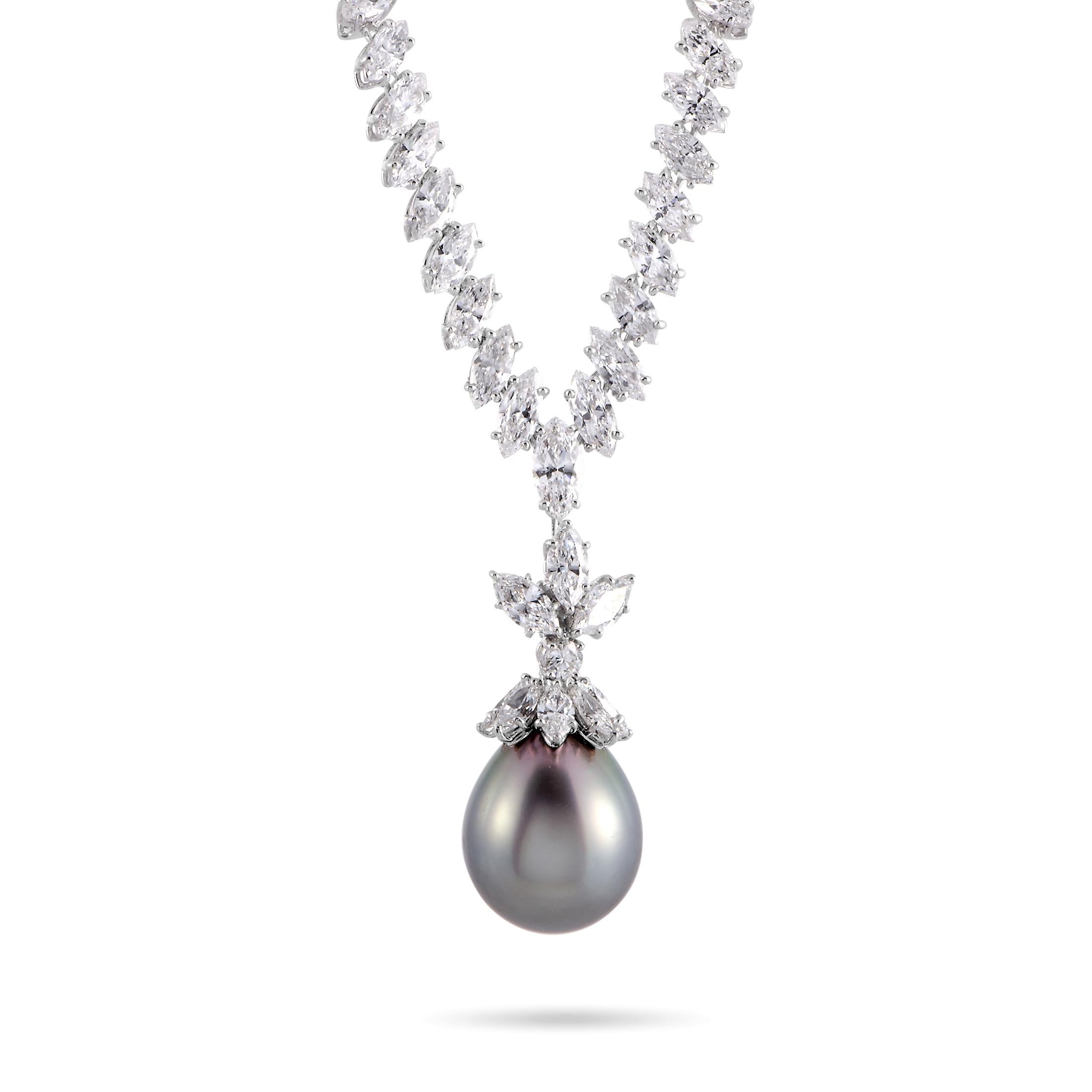 This Boucheron necklace is made of 18K white gold and weighs 55.1 grams, boasting a 15.00” chain with box tab insert closure and a pendant that measures 1.65” in length and 0.50” in width.

The necklace is set with a 16 mm Tahitian pearl and with an