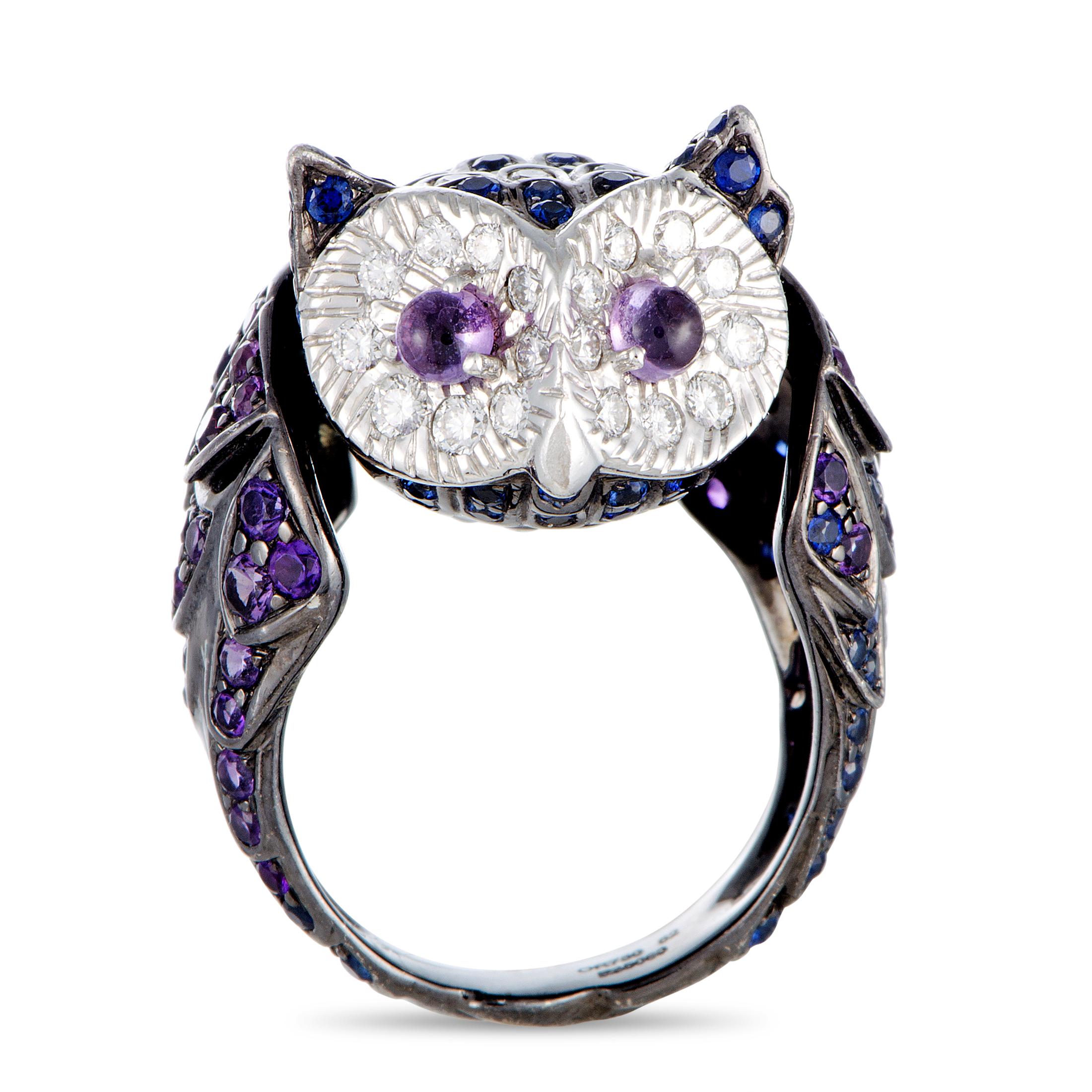 This Boucheron ring is made of rhodium-plated 18K white gold and embellished with diamonds, sapphires, and amethysts. The ring weighs 19.3 grams and boasts band thickness of 4 mm and top height of 10 mm, while top dimensions measure 25 by 20