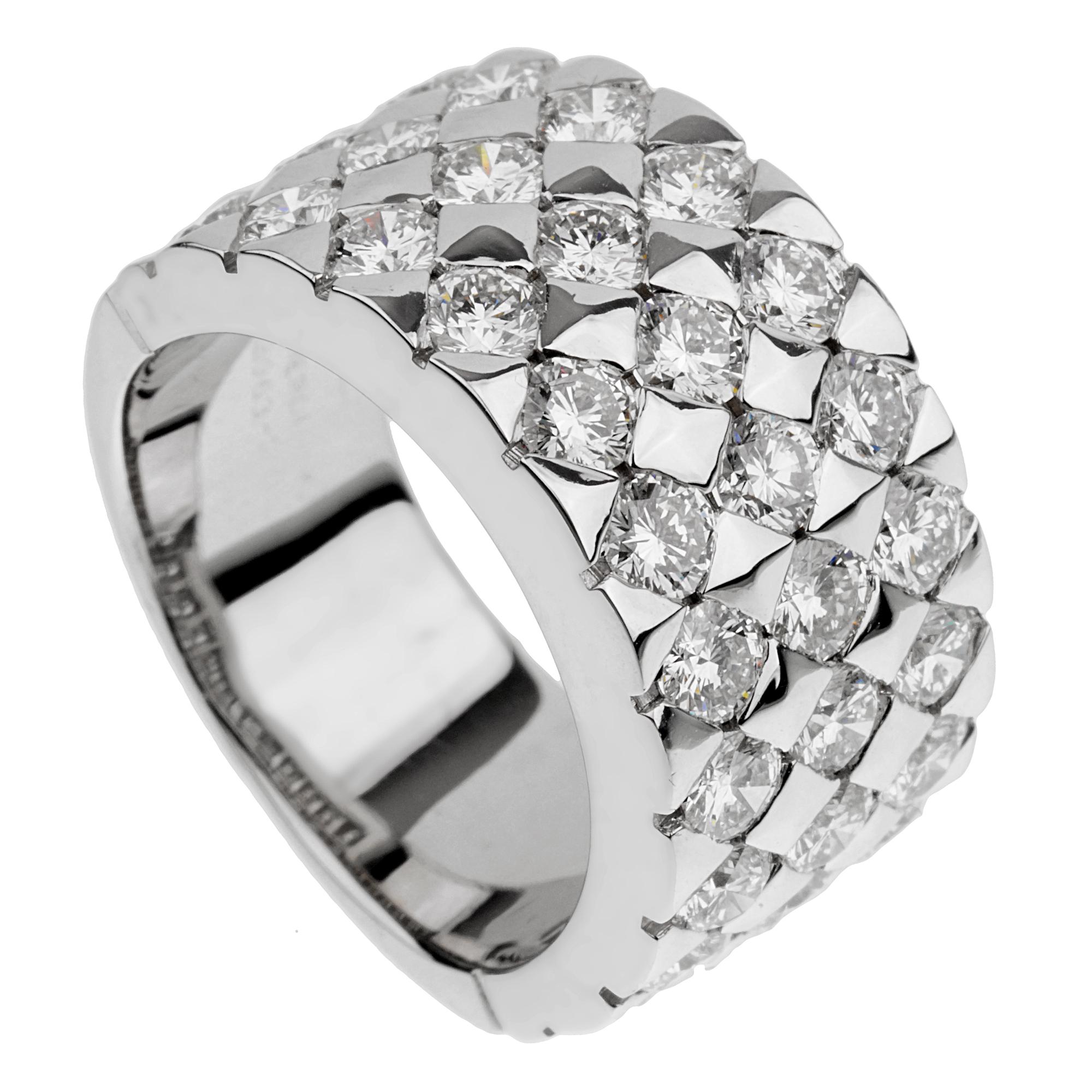 A fabulous authentic Boucheron diamond ring showcasing 33 of the finest round brilliant cut diamonds set in 18k white gold. The diamonds are securely set in a square motif to ensure a chic and everlasting look. The ring measures a size 6 3/4 and can