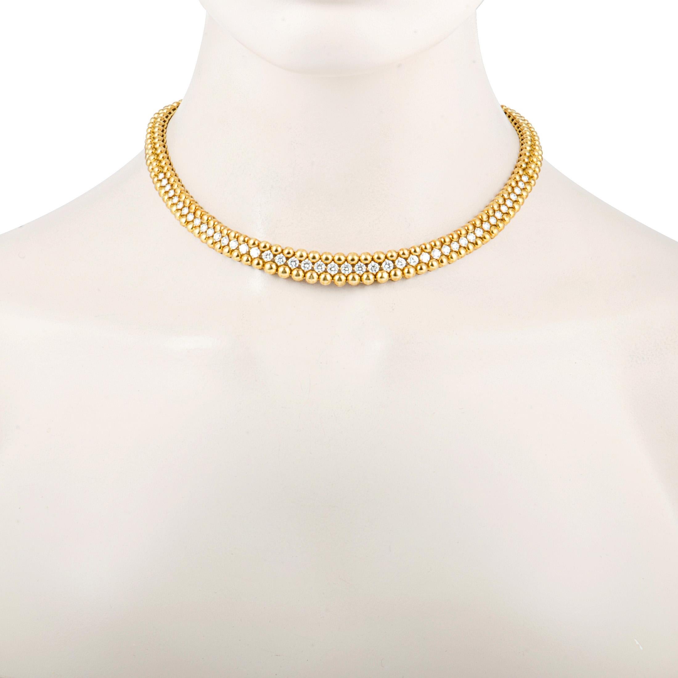 Gracefully adorn your evening look with this fashionably elegant necklace by Boucheron. The glamorous necklace is beautifully designed with simmering 18K yellow gold and embellished with 5.00ct of sparkling E-F color, VS1 clarity diamonds.
