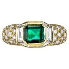Boucheron emerald and diamond cluster ring, French, circa 1980.