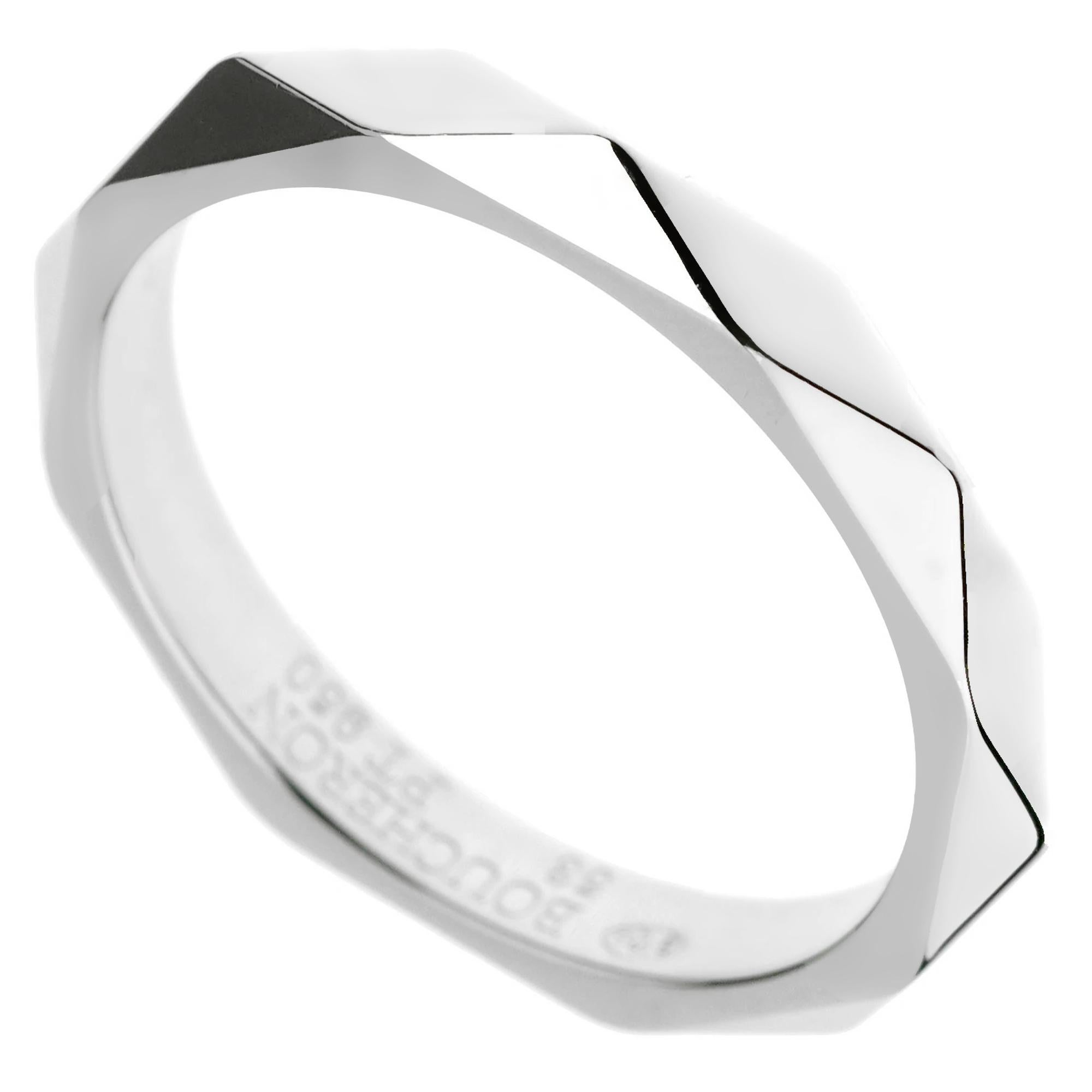 Expertly crafted in lustrous platinum, this captivating band ring features a unique faceted design that subtly reflects the light, creating a mesmerizing play of shimmer and sparkle. The polished finish accentuates the sculptural contours of the