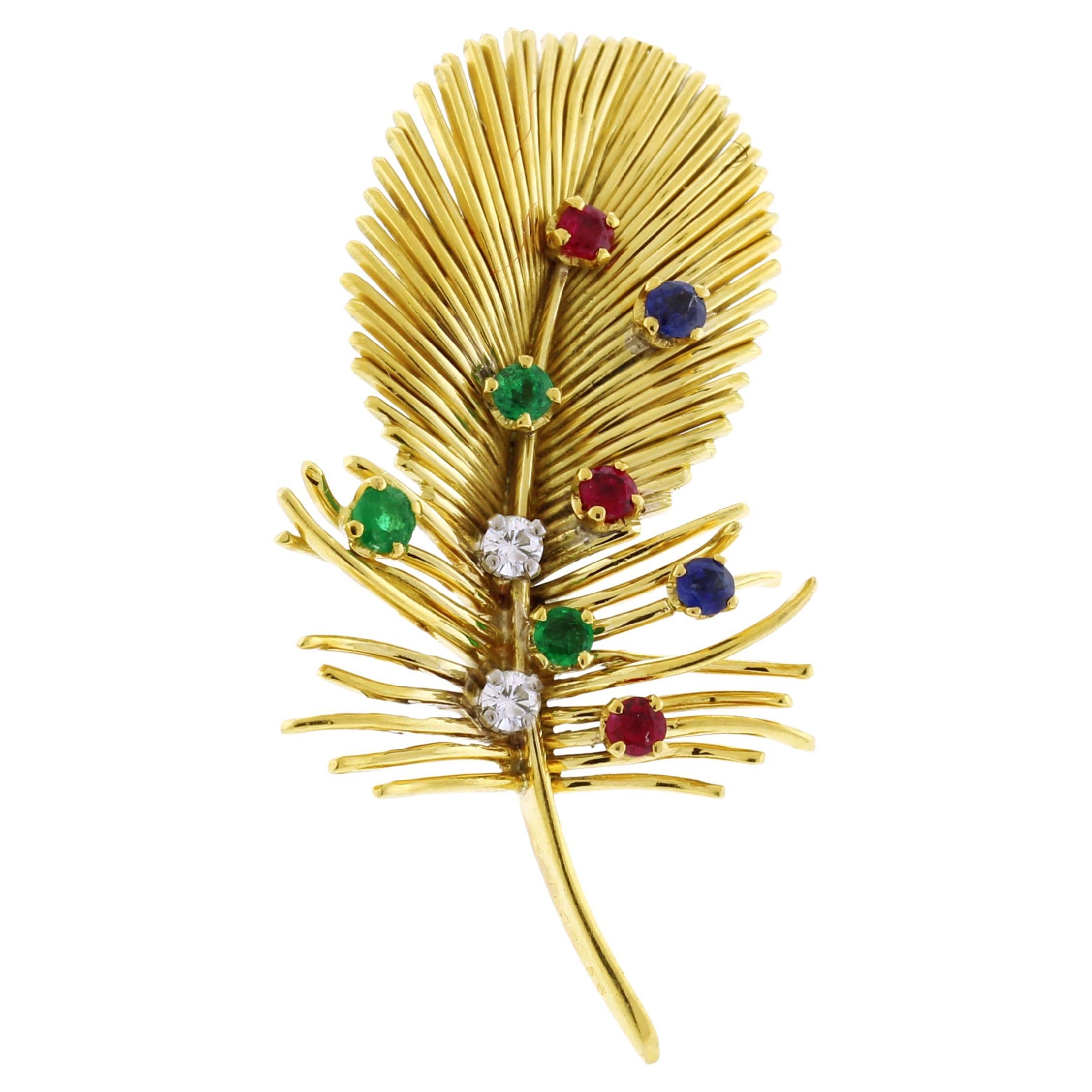 Broche plume de Boucheron avec émeraudes, rubis, saphirs et diamants en vente