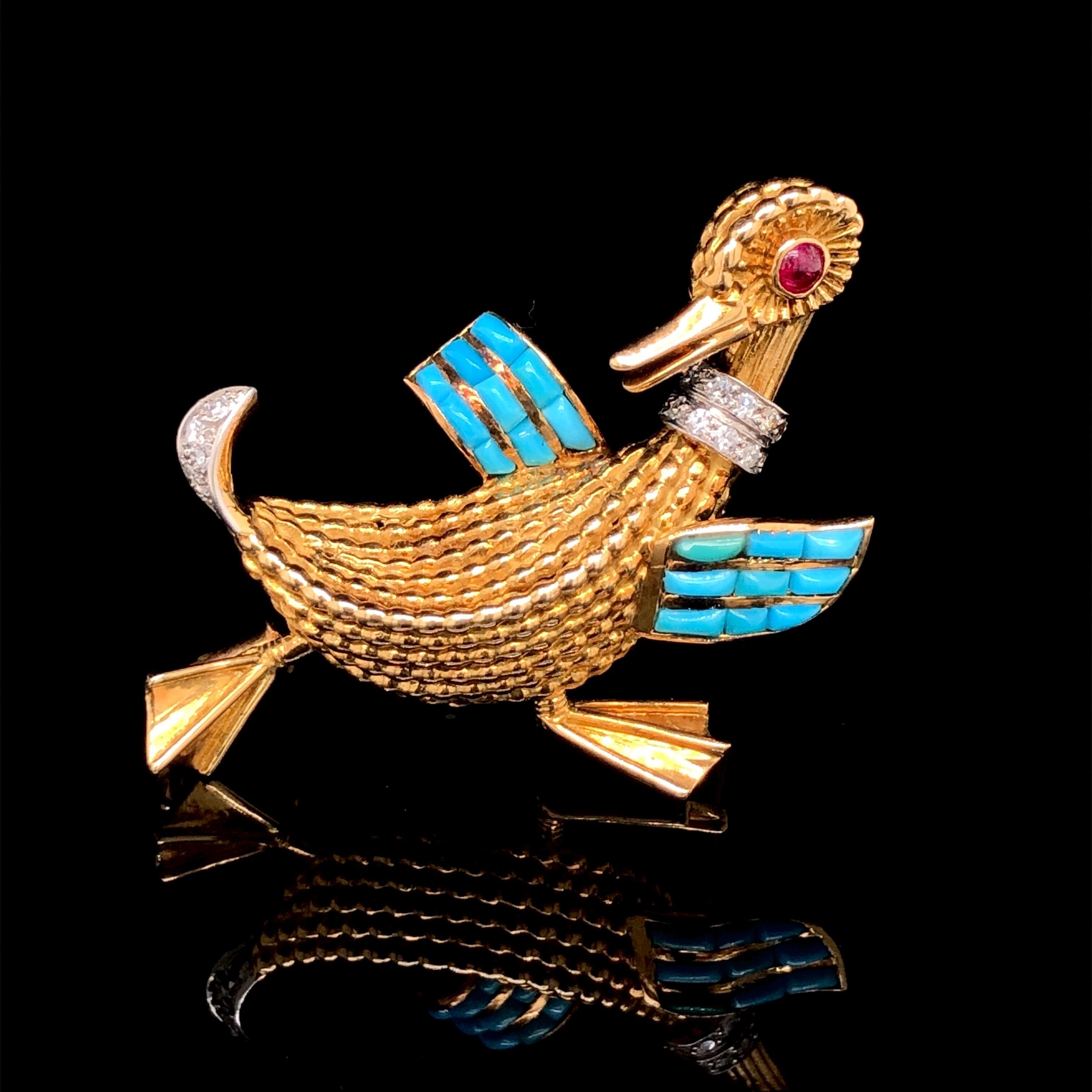 A ruby, diamond and turquoise gold duck brooch, ca. 1960s, Boucheron, France.

The whimsical duck brooch is beautifully adorned with a ruby cabochon eye, buffed turquoise wings and round brilliant cut diamonds and gold wire feathers. It is very fine