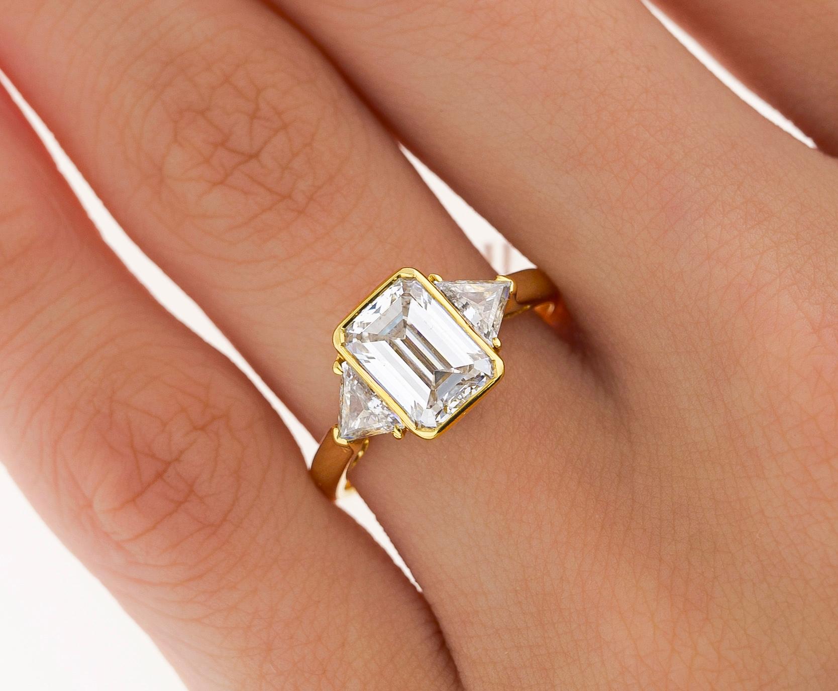 Boucheron GIA Certified 2.09 Carat Emerald Cut Diamond & Trillion 3 Stone Ring For Sale 7
