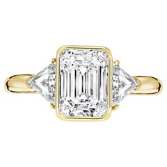 Boucheron GIA Certified 2.09 Carat Emerald Cut Diamond & Trillion 3 Stone Ring