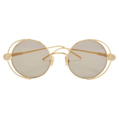 Boucheron Goldfarbene/graue BC0031S Schlange Boheme Runde Sonnenbrille