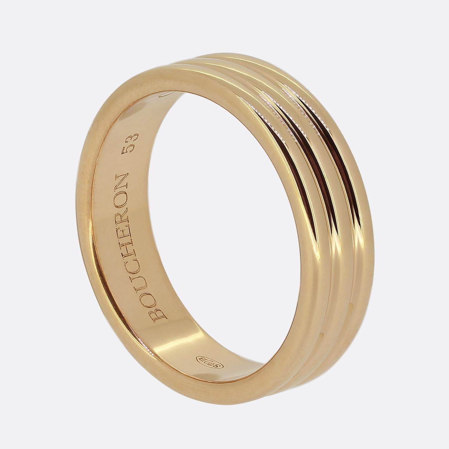 Here we have a sleek band ring by Boucheron. This piece has been crafted from 18ct rose gold, featuring a smooth, polished finish. The design includes three parallel grooves encircling the band, adding subtle texture and depth.

Condition: Used