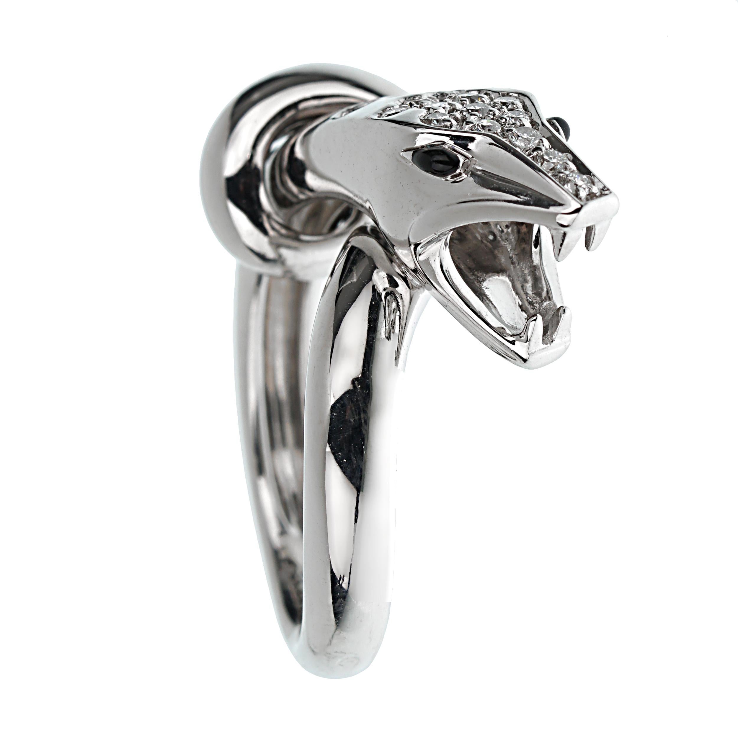 This exquisite Boucheron ring is a stunning representation of the brand's commitment to luxurious and innovative jewelry design. Crafted from 18k white gold, this ring showcases a striking snake motif, embodying both elegance and a touch of
