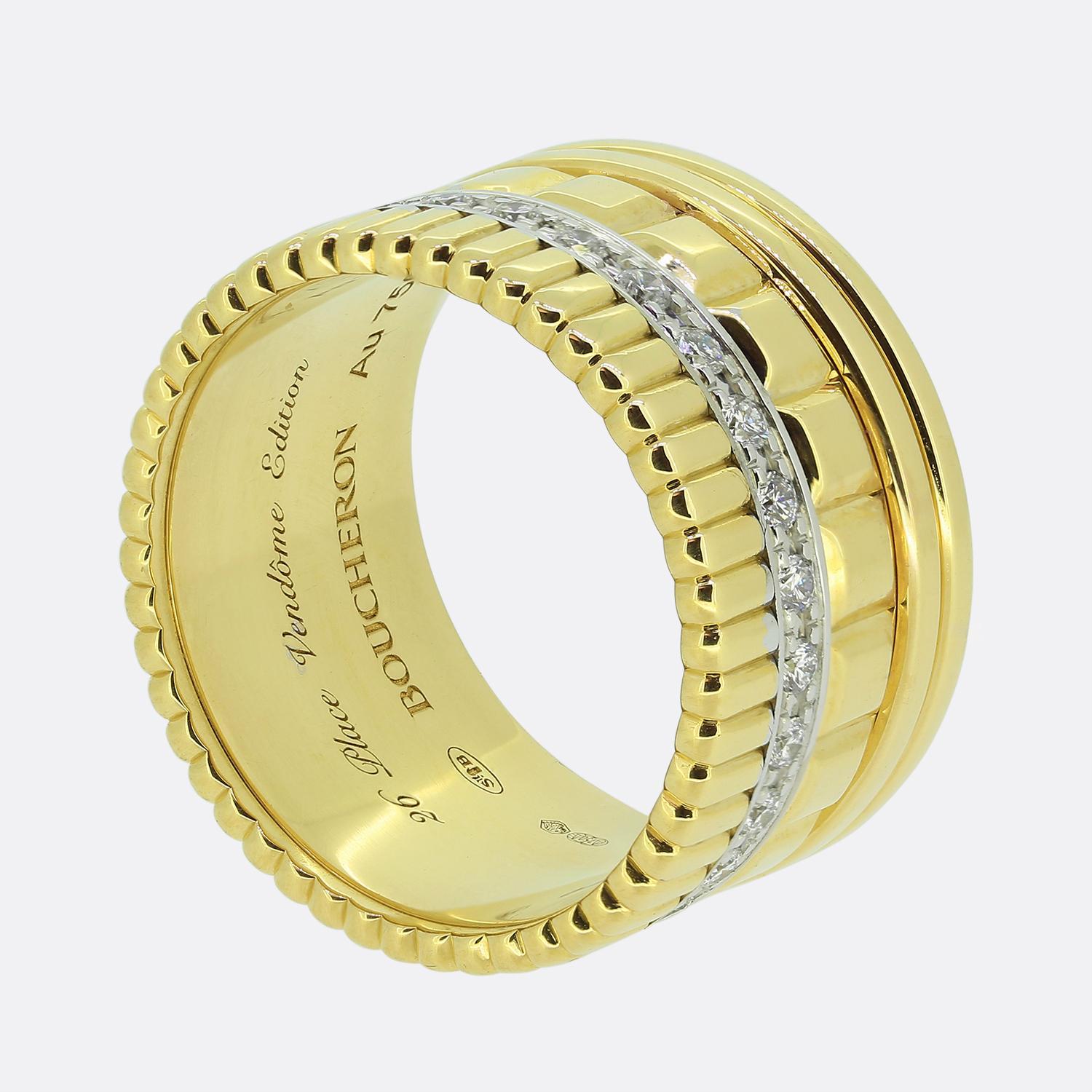 Here we have a wonderfully crafted 18ct yellow gold band ring from the world renowned French jewellery designer, Boucheron. The design showcases a textured gold band with a central row of sparkling diamonds set in a contrasting white gold channel.