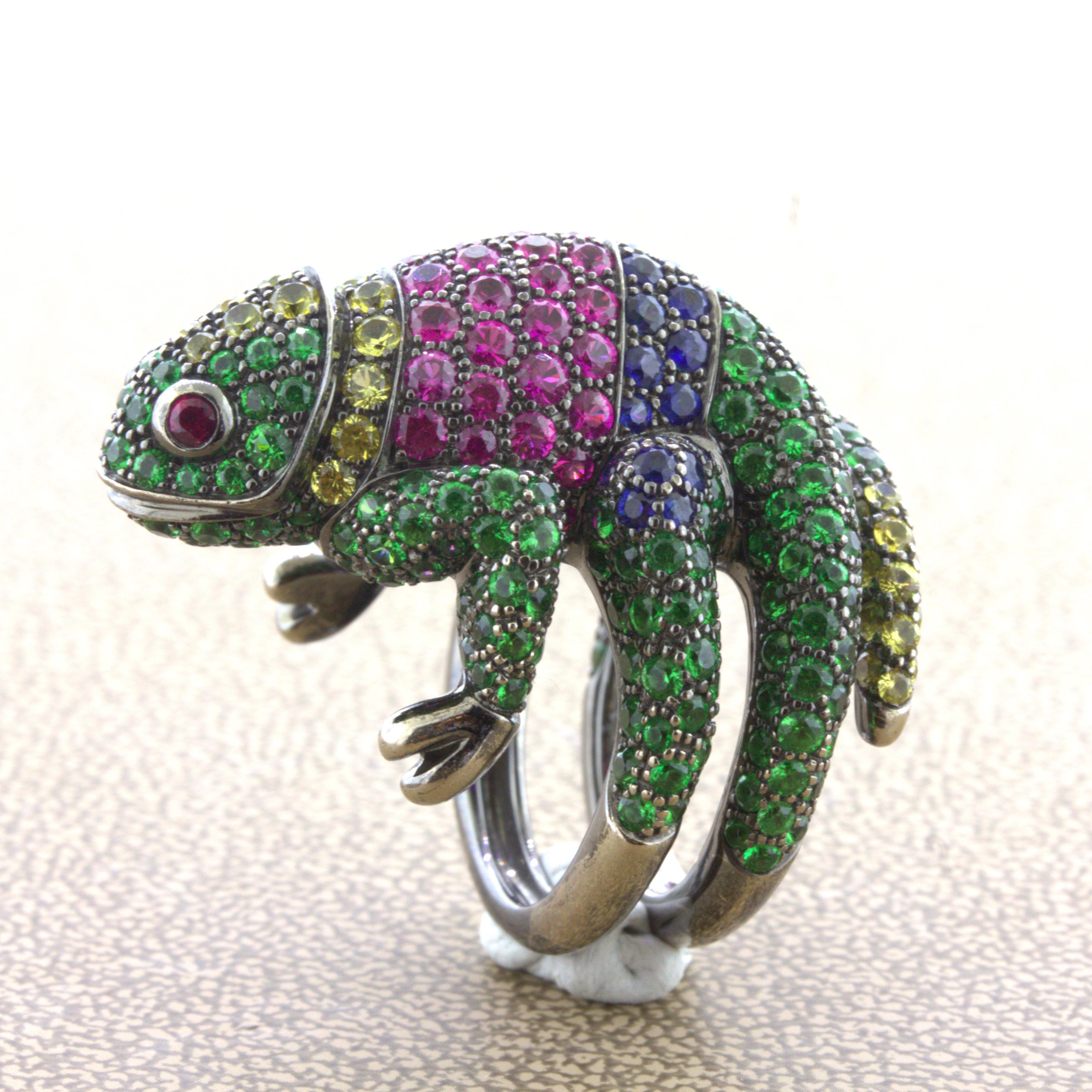A rare and whimsical ring from Bucheron’s Animal Collection, this is Masy the Chameleon. It features an array of bright and vividly colored gemstones which include tsavorite, blue sapphire, yellow sapphire, pink sapphire, and ruby. Masy’s body is
