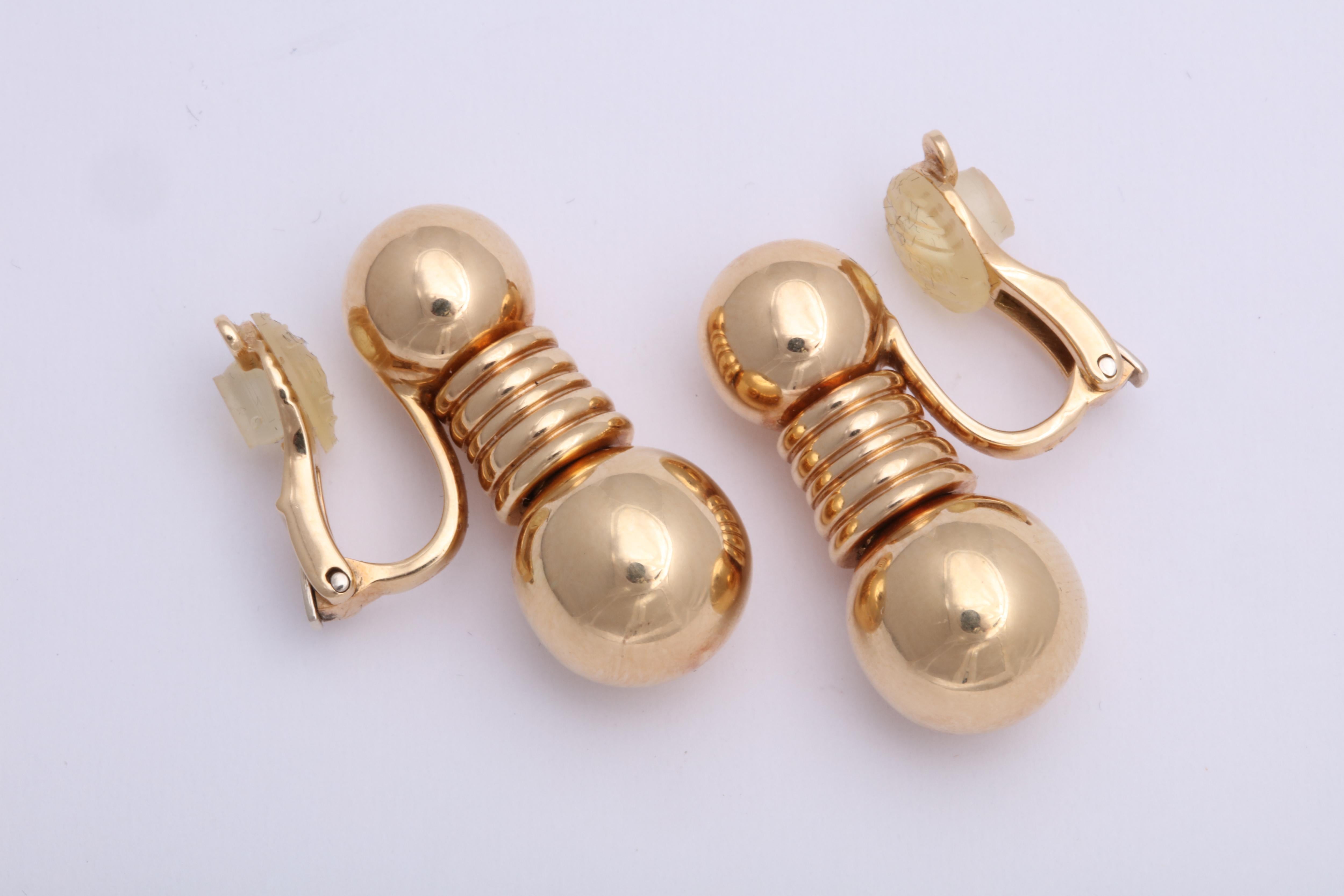 Stylized 18kt Rose gold Clip on Double Ball Earrings.  Signed Boucheron and numbered.  These earrings are fabulous and move slightly as you move.  Very Subtle.   Clip on but easily converted to pierced. 