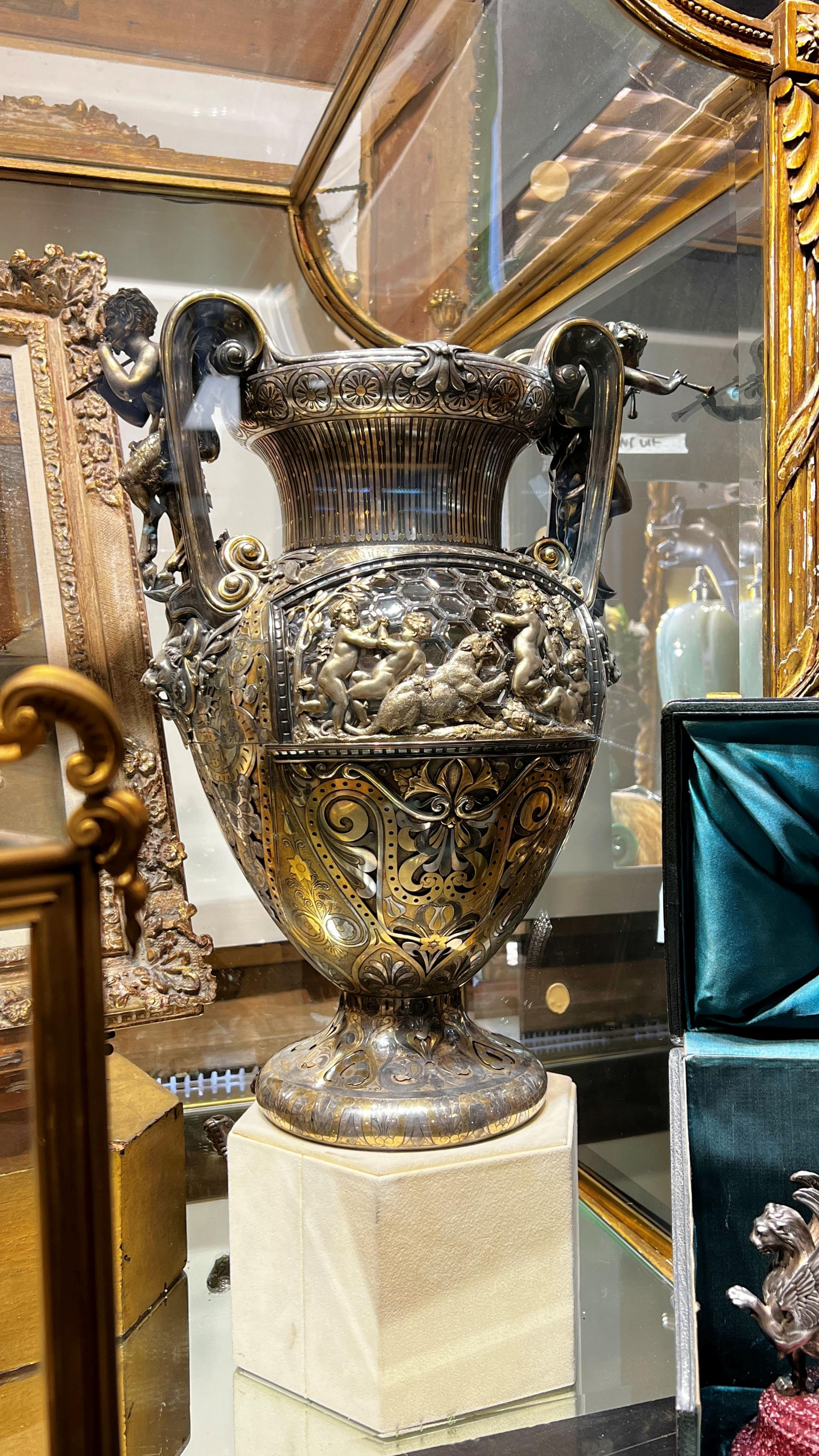 Our important parcel-gilt and patinated silver and glass-mounted vase and matching oil lamp were designed by Paul Legrand (1840-1910) and crafted by the silversmith, Charles Glachant, for Boucheron of Paris, circa 1878-1880. 21 in tall and 16.5 in