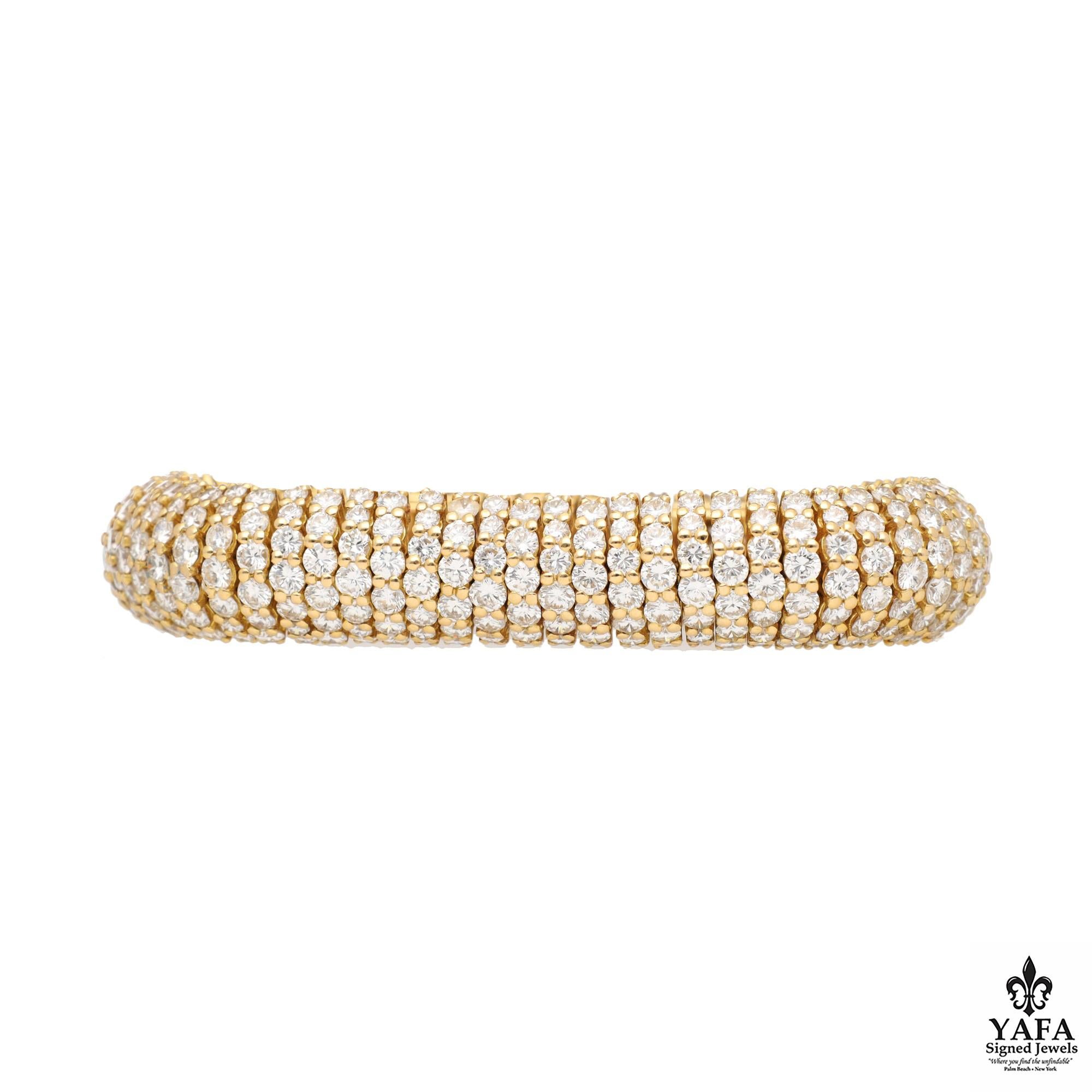 Boucheron 18k yellow gold flexible diamond bracelet. The warm, lustrous gold and brilliant diamonds exudes a timeless appeal, while the subtle detailing demonstrates Boucheron's unwavering commitment to excellence. Composed of multiple rows of