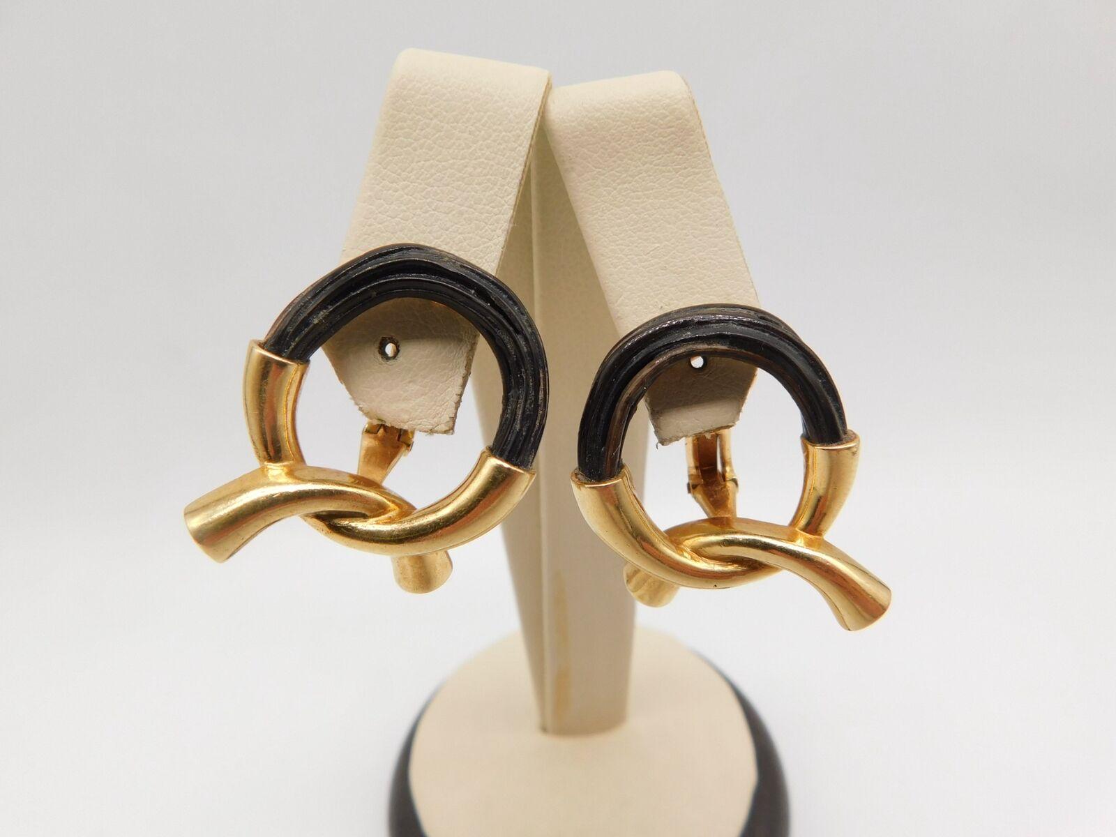 Boucheron Paris 18k Yellow Gold & Elephant Hair Clip On Earrings Vintage Circa 1970s

Here is your chance to purchase a beautiful and highly collectible designer earrings.  

 The earrings are marked Boucheron Paris with maker marks, French