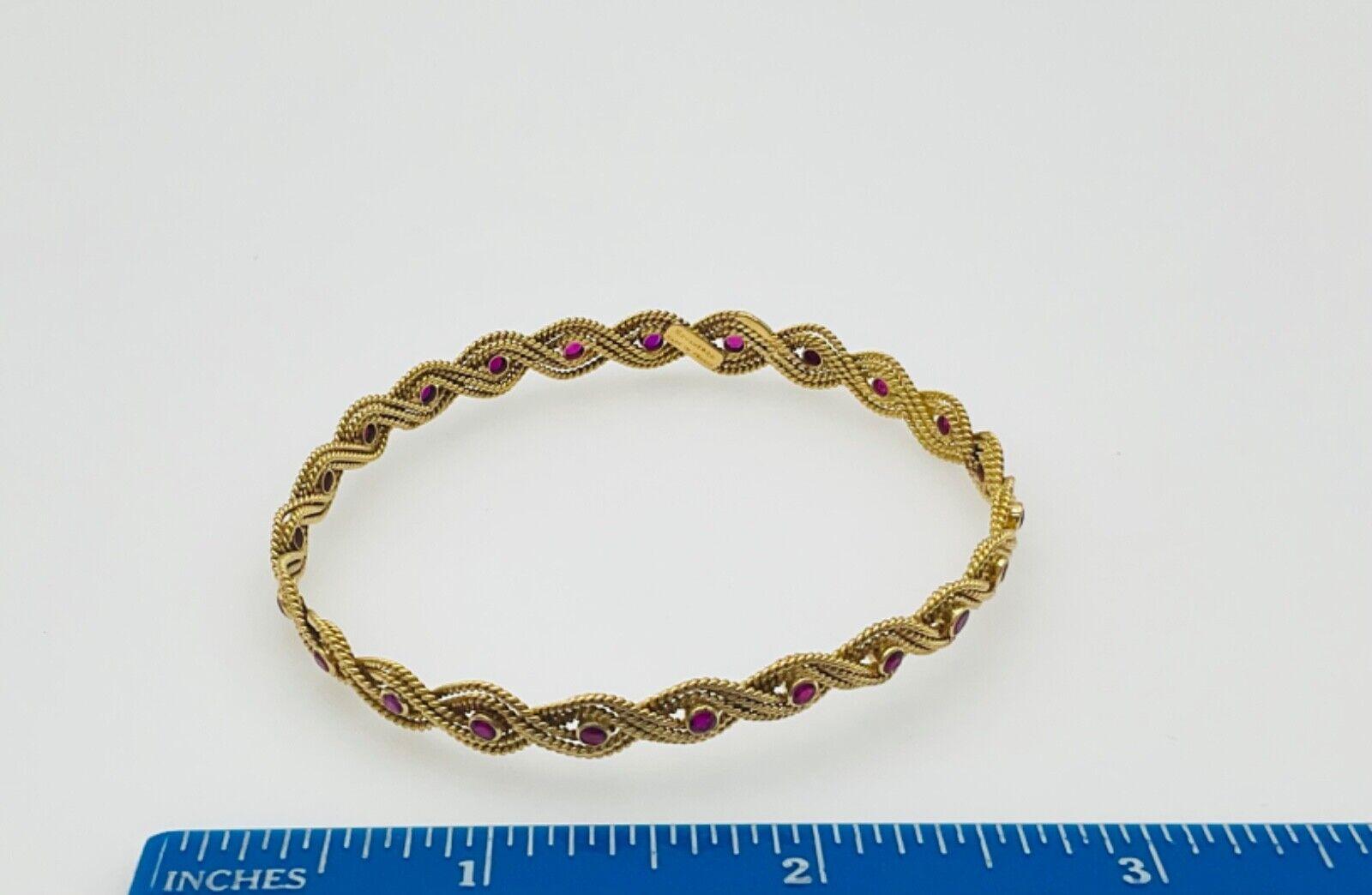 BOUCHERON PARIS 18k Yellow Gold & Ruby Woven Bangle Bracelet Vintage C. 1960s In Excellent Condition For Sale In Beverly Hills, CA