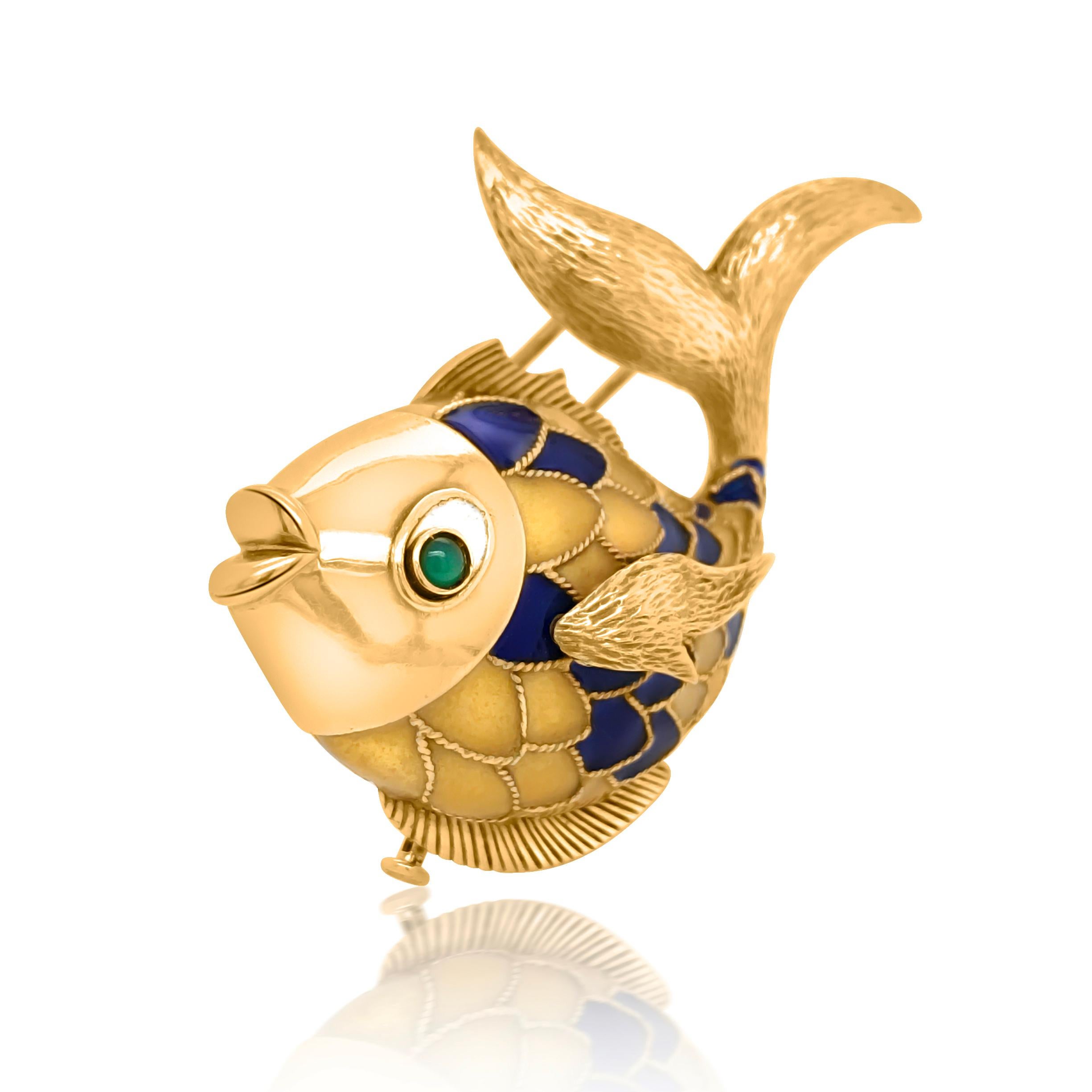 18kt Gold and Enamel Fish Brooch, Boucheron, Paris, with cabochon gemstone eye, 
This enchanting enamel brooch depicts the anatomically accurate sculptured silhouette of a fish, crafted in solid 18 karat yellow gold, weighing 20.6 grams and