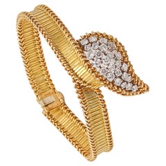 BOUCHERON Paris 1950 Modernistisches Armband aus 18 Karat Gold, Platin und 2,60 Karat Diamanten