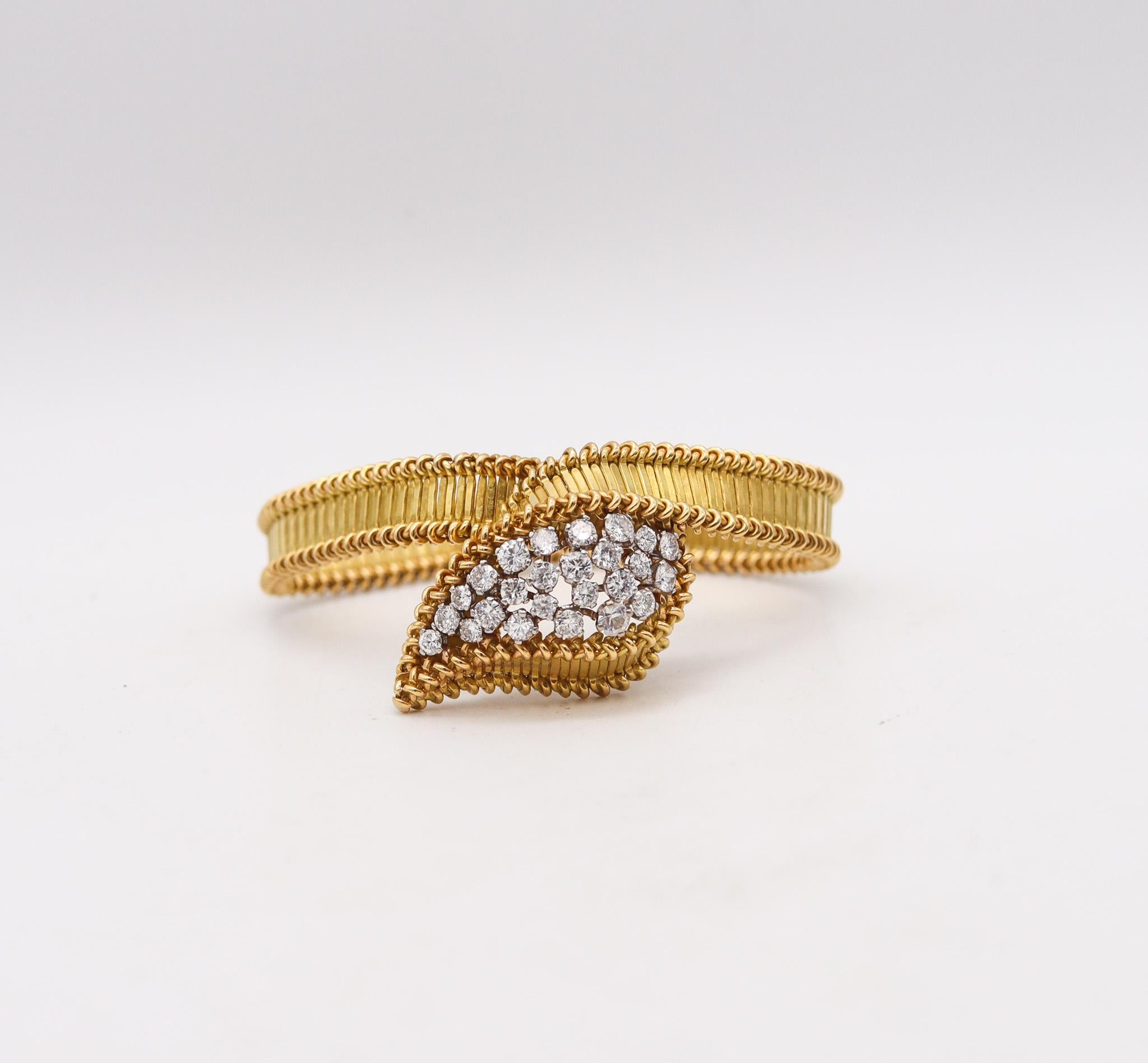 Retro modernist bracelet designed by Boucheron.

Fabulous flexible bracelet created by the iconic French jewelry house of Boucheron. This statement and unusual bracelet was made in Paris at the atelier of Andre Vassort, during the post-war period,