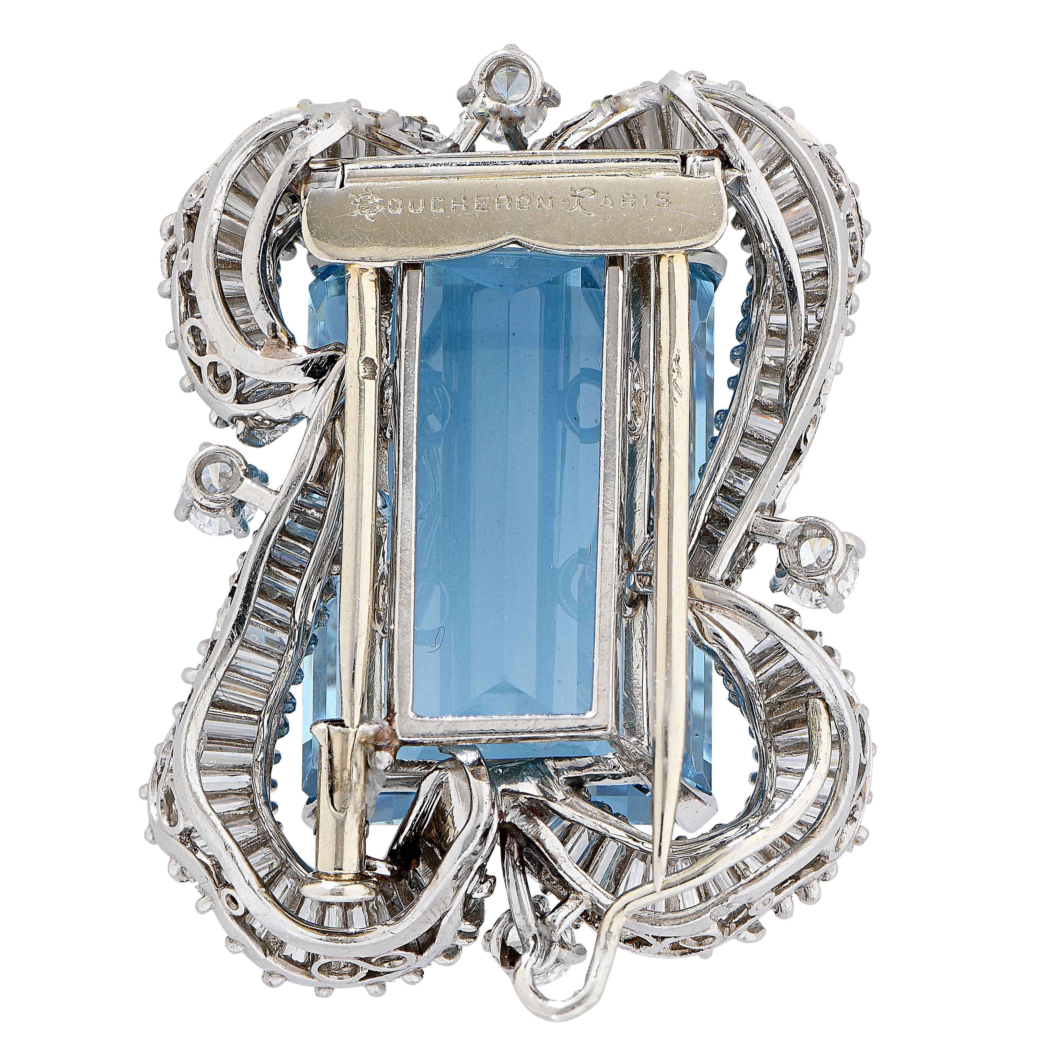 Boucheron Paris Aquamarine and Diamond Platinum and 18kt white gold brooch. This gorgeous brooch features a rectangular cut aquamarine with an estimated total weight of 32.5 carats and 68 diamonds with an estimated total weight of 5.4 carats F color