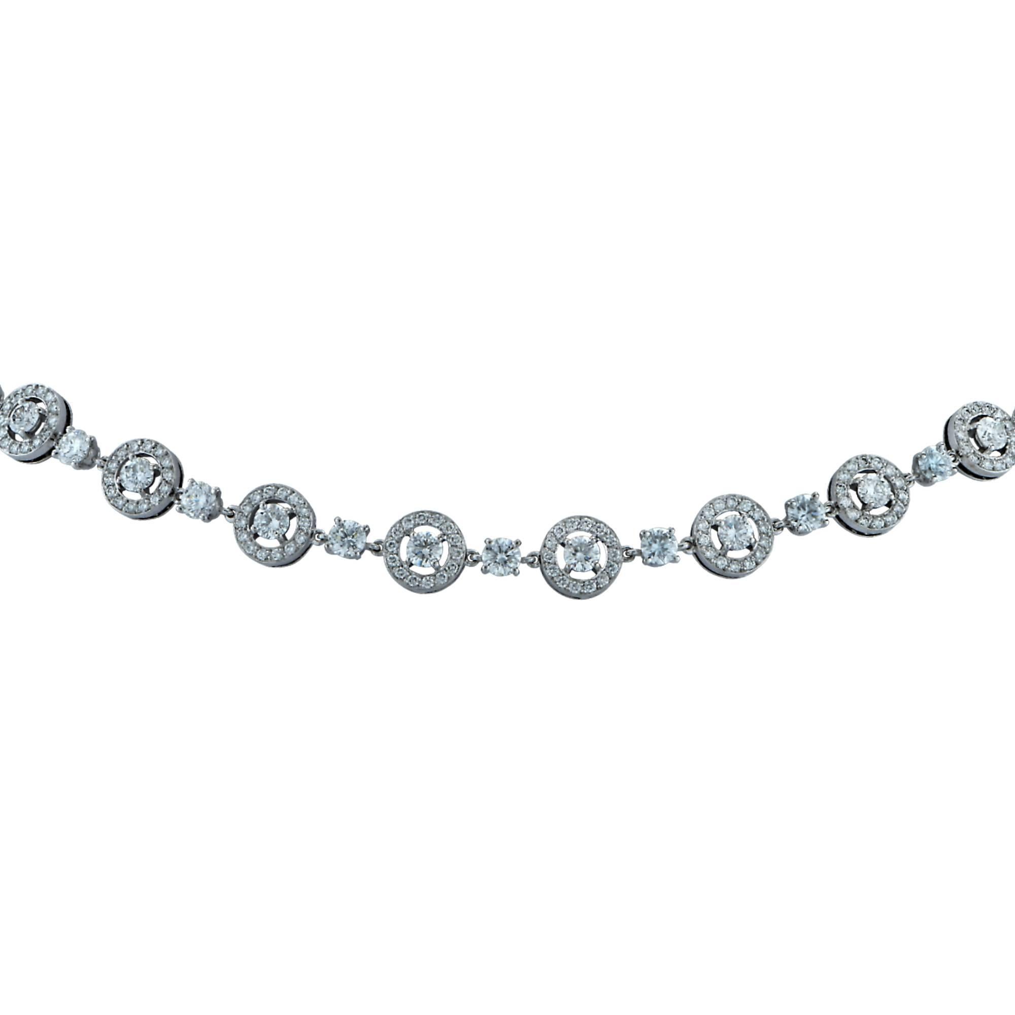 From the house of Boucheron Paris, this spectacular necklace from the Ava Collection, crafted in 18k white gold, features 431 round brilliant cut diamonds weighing approximately 12.8cts F color and VS clarity. These extremely white vibrant diamonds