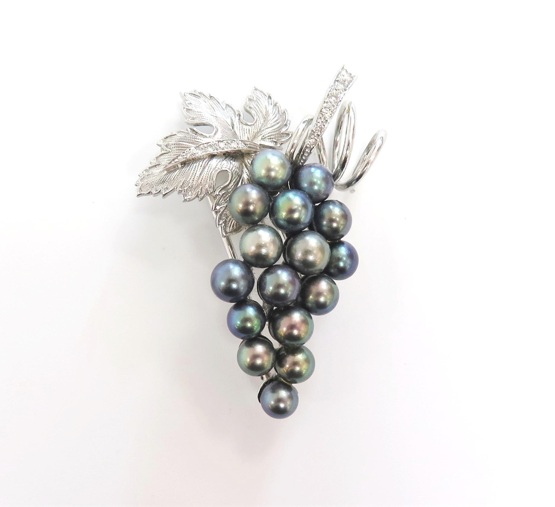 Boucheron, the first jeweler of the Place Vendome, creator of fine jewelry, high-end jewelry, and luxury watches is based in Paris.

This beautifully made black cultured pearl brooch (double pin / fur clip) is crafted in 14 karat white gold. The