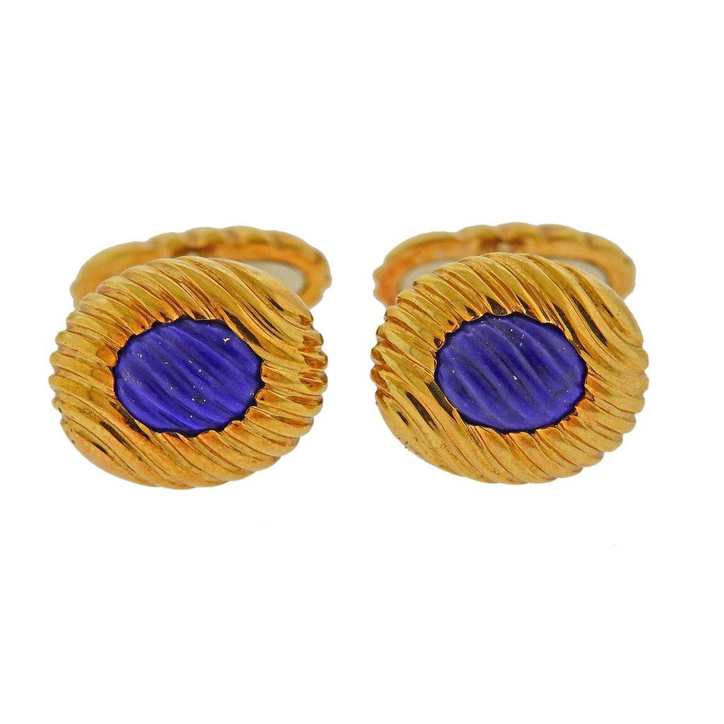 Pair of 18k yellow gold cufflinks by Boucheron, set with carved lapis. Cufflink top is 15mm x 13mm, back - 17mm x 8mm. Weight is 16.6 grams. Marked Boucheron, French eagle mark, B4627309, 750.