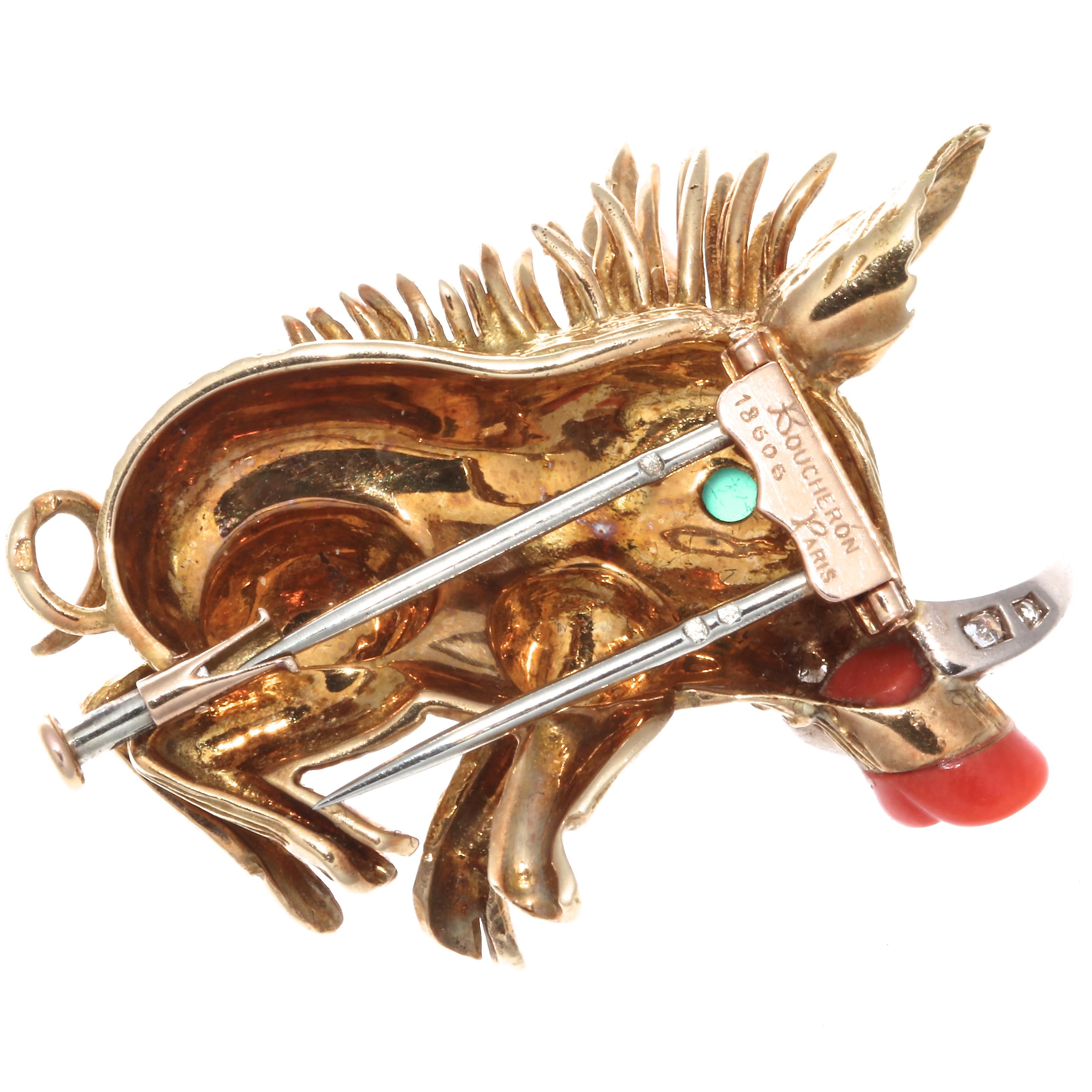 A Boucheron Paris conversation starter, a diamond emerald coral boar brooch. With 5 single cut diamonds that weigh approximately 0.15 carats, graded D-E color, VVS clarity. The eye is made of a cabochon chrysophrase that weighs approximately .10