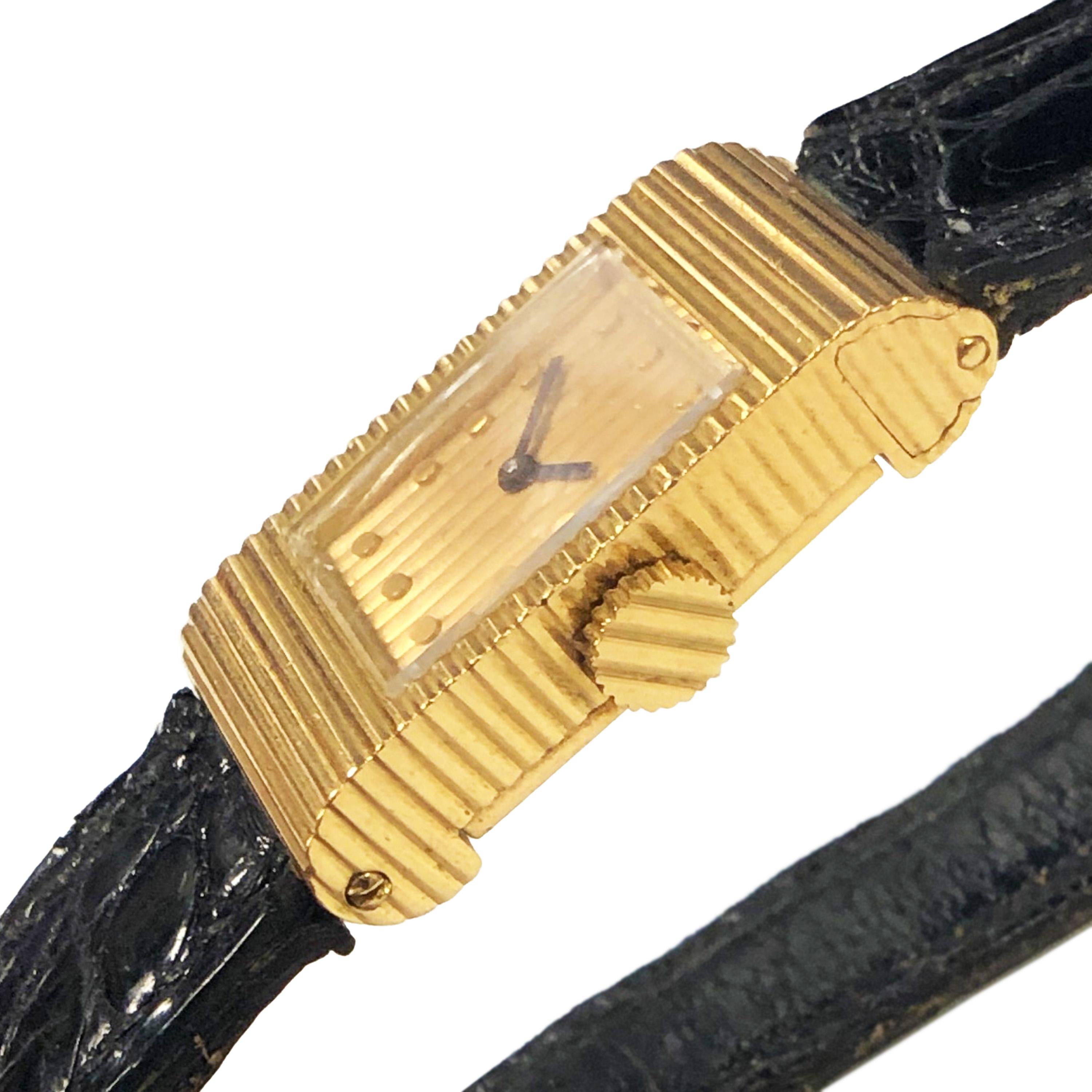 Circa 1960s Boucheron Paris Wrist Watch owned and worn by Hollywood Entertainment Icon Jerry lewis. 18K Yellow Gold 2 piece case measuring 1 X 1/2 inch, having a ribbed design with a unique hidden slide fitting where the Strap fits into the case. 17