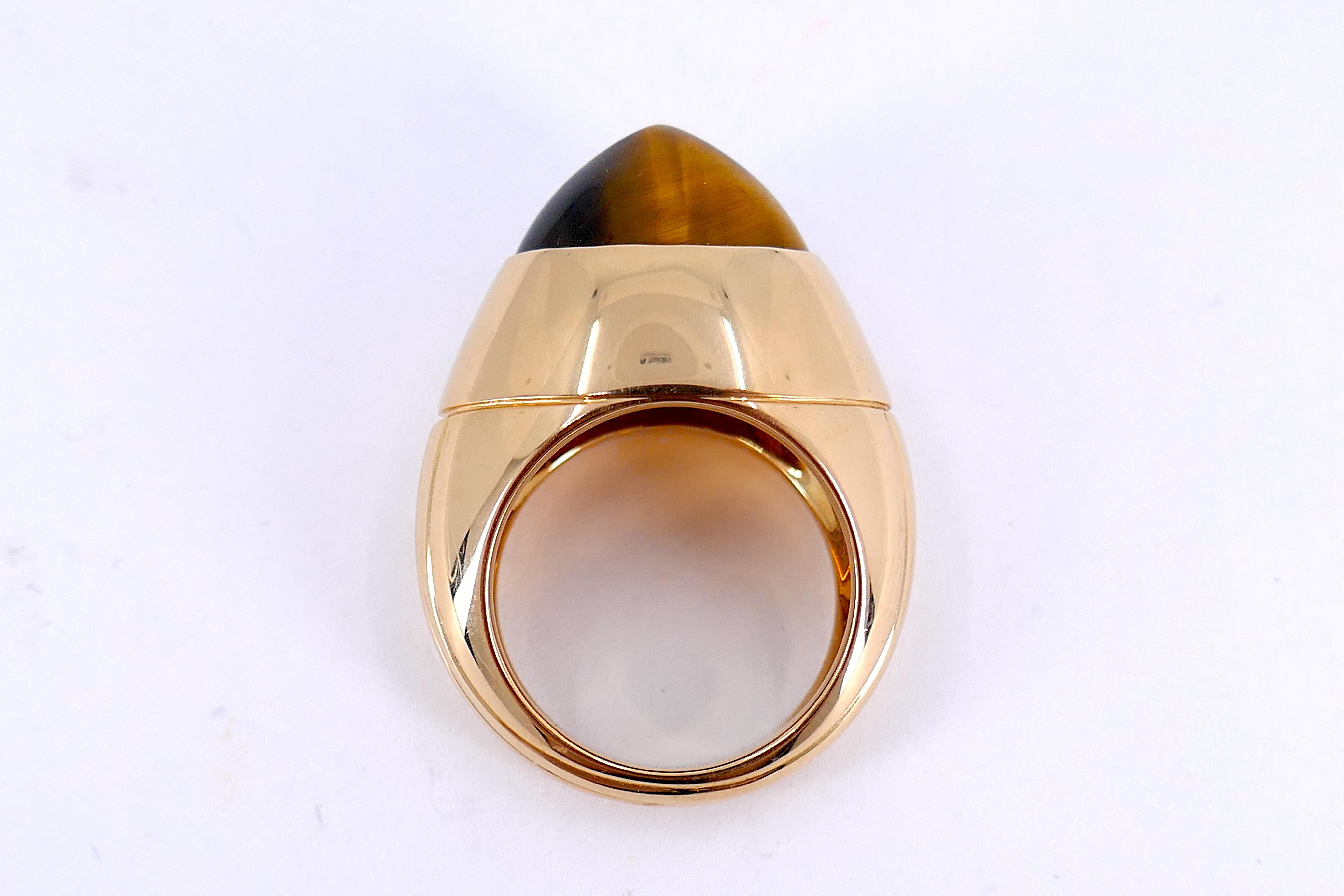 Boucheron Paris High dome cabochon Tiger eye Ring 18k Rose gold Size 5.5
Marks: BOUCHERON OR750 / 50 E25738
French Essay Mark: Eagle
Makers Mark: SBB

Elevate your jewelry collection with the Boucheron Paris High Dome Cabochon Tiger Eye Ring in 18K