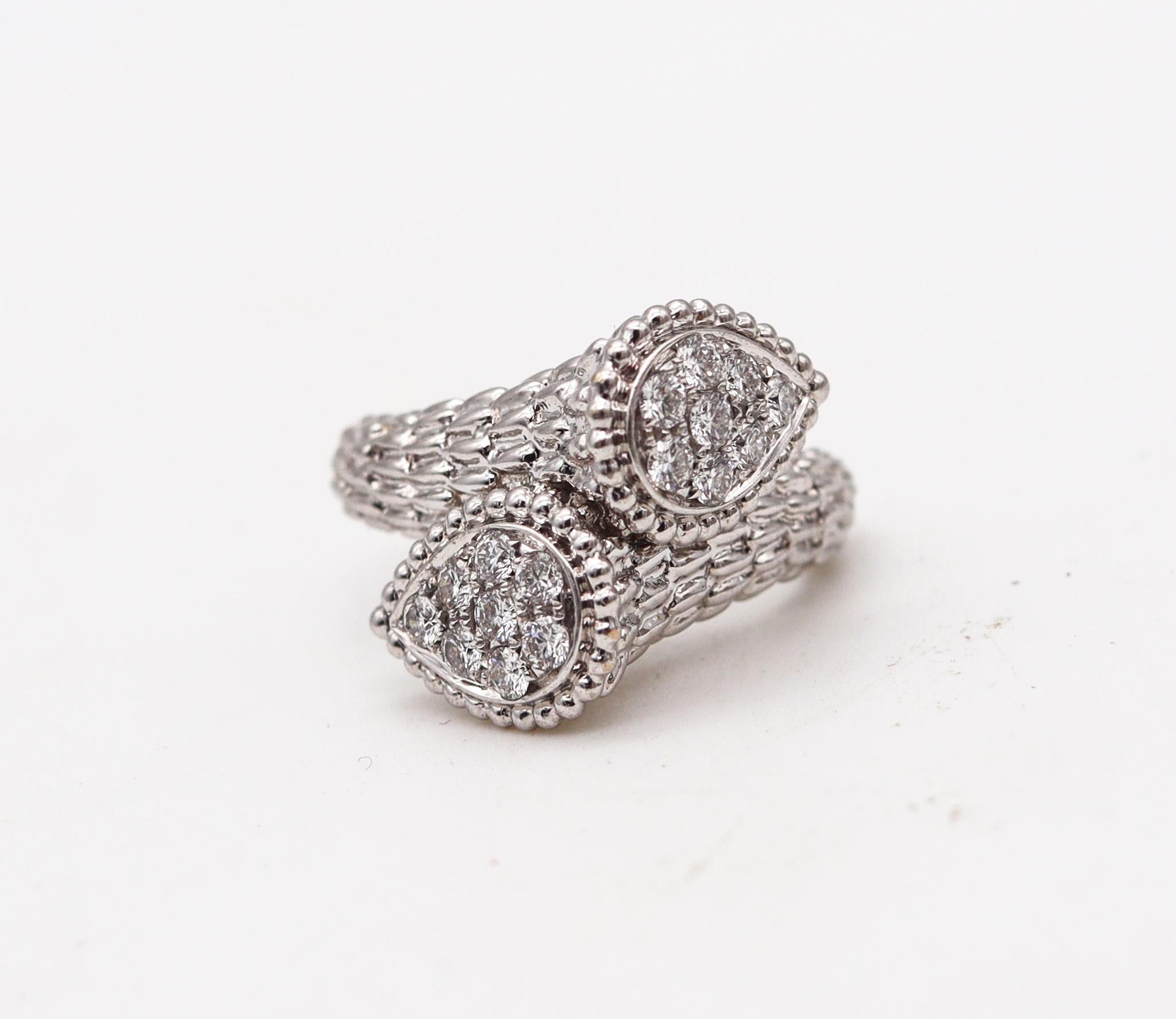 Serpent Boheme Toe Et Moi ring designed by Boucheron.

This is one of the most contemporary iconic designs, created by the French jewelry house of Boucheron. This classic Serpent Boheme Toi et Moi ring has been carefully crafted in solid textured