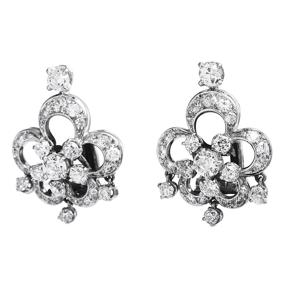 Celebrate yourself with these Pair of 1930's Vintage platinum French Boucheron earrings with foliated decoration adorned with Old European-cut diamond totaling 2.50 carats, G-H, VS clarity in excellent condition,

Signed Bucheron Paris

Accompanied