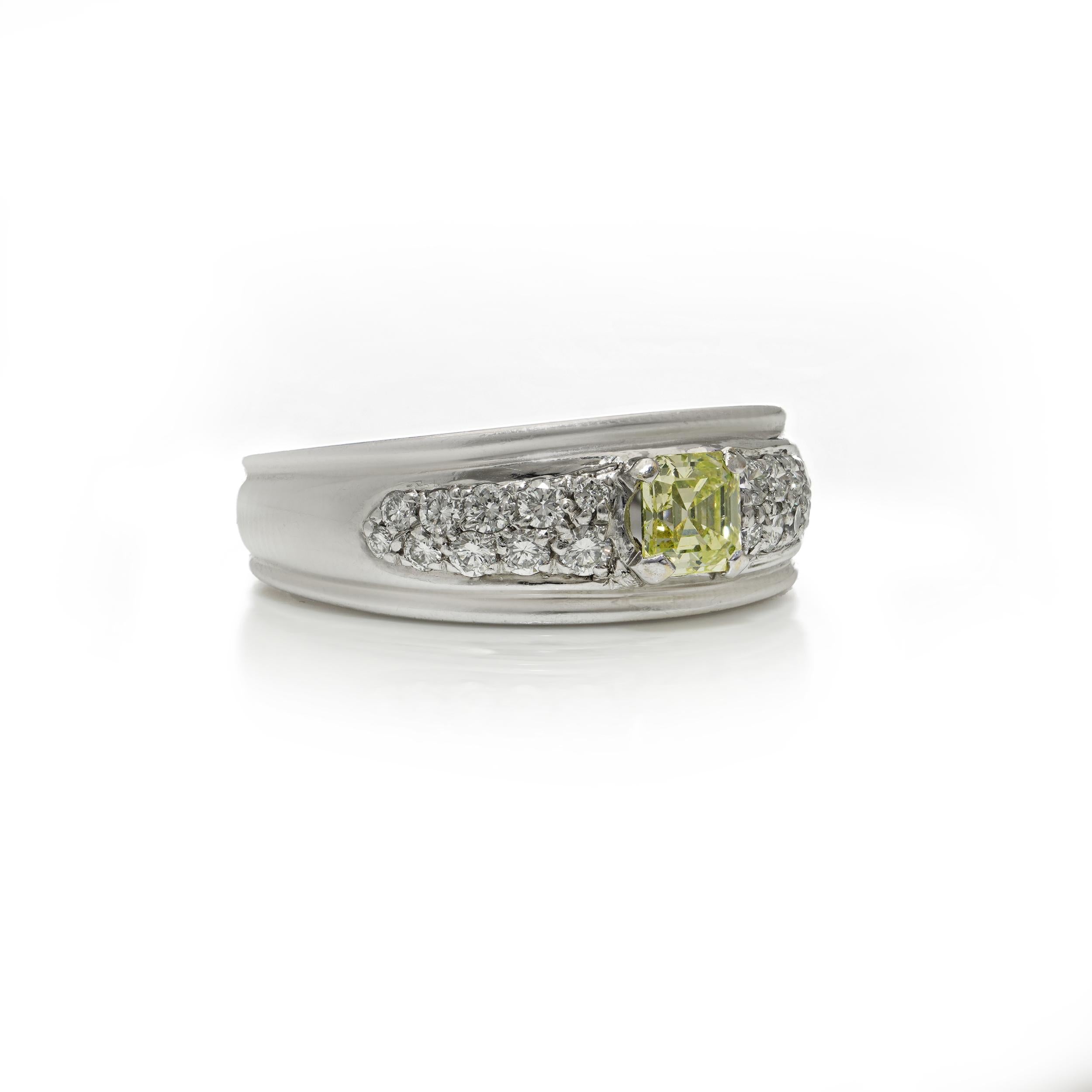 Emerald Cut Boucheron Platinum & White Gold Ring with Fancy Yellow Diamonds For Sale