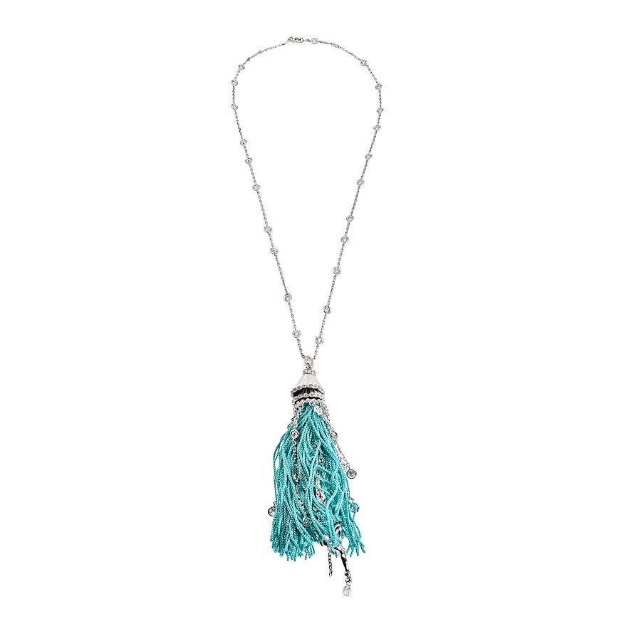 Boucheron Pompon Necklace with Turquoise tassels and a center dancer charm. The Chain Features diamond by the yard bezel set diamonds. 
Style JPN152 
