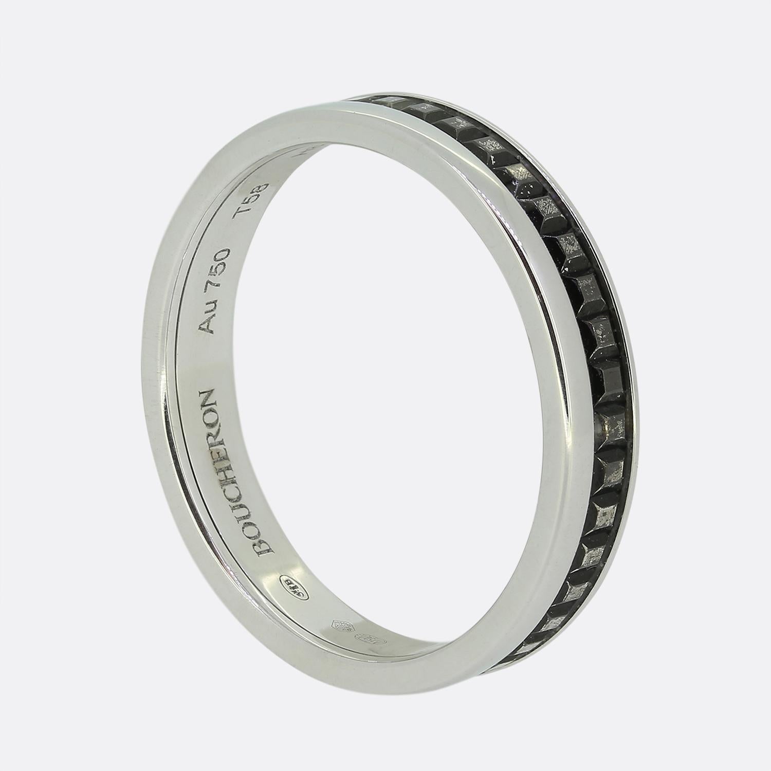 Here we have a sleek 18ct white gold band ring from Boucheron. A signature Boucheron design, this Quatre Black Edition combines two emblematic codes, the Godron and the Clou de Paris. Beautifully reflecting the light with its 18ct white gold frame,