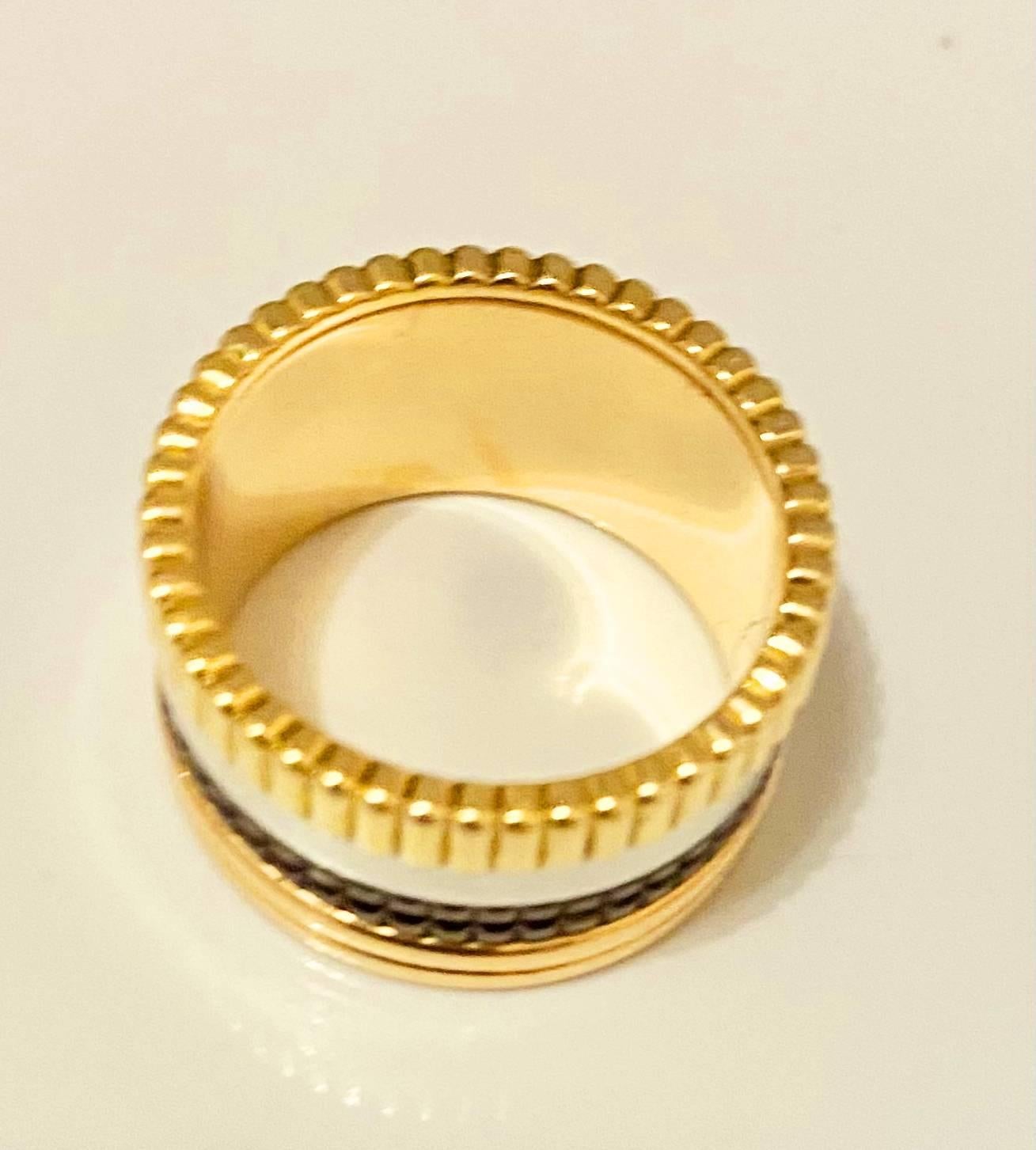 BOUCHERON COLLECTION QUATRE FOUR CLASSIC LARGE RING 

Boucheron ring from the Quatre collection, Classique Large, in 18-carat yellow and pink white gold and black PVD
Size: 55mm 
Year: 2010 
Condition: good, slight wear, barely visible, comes with