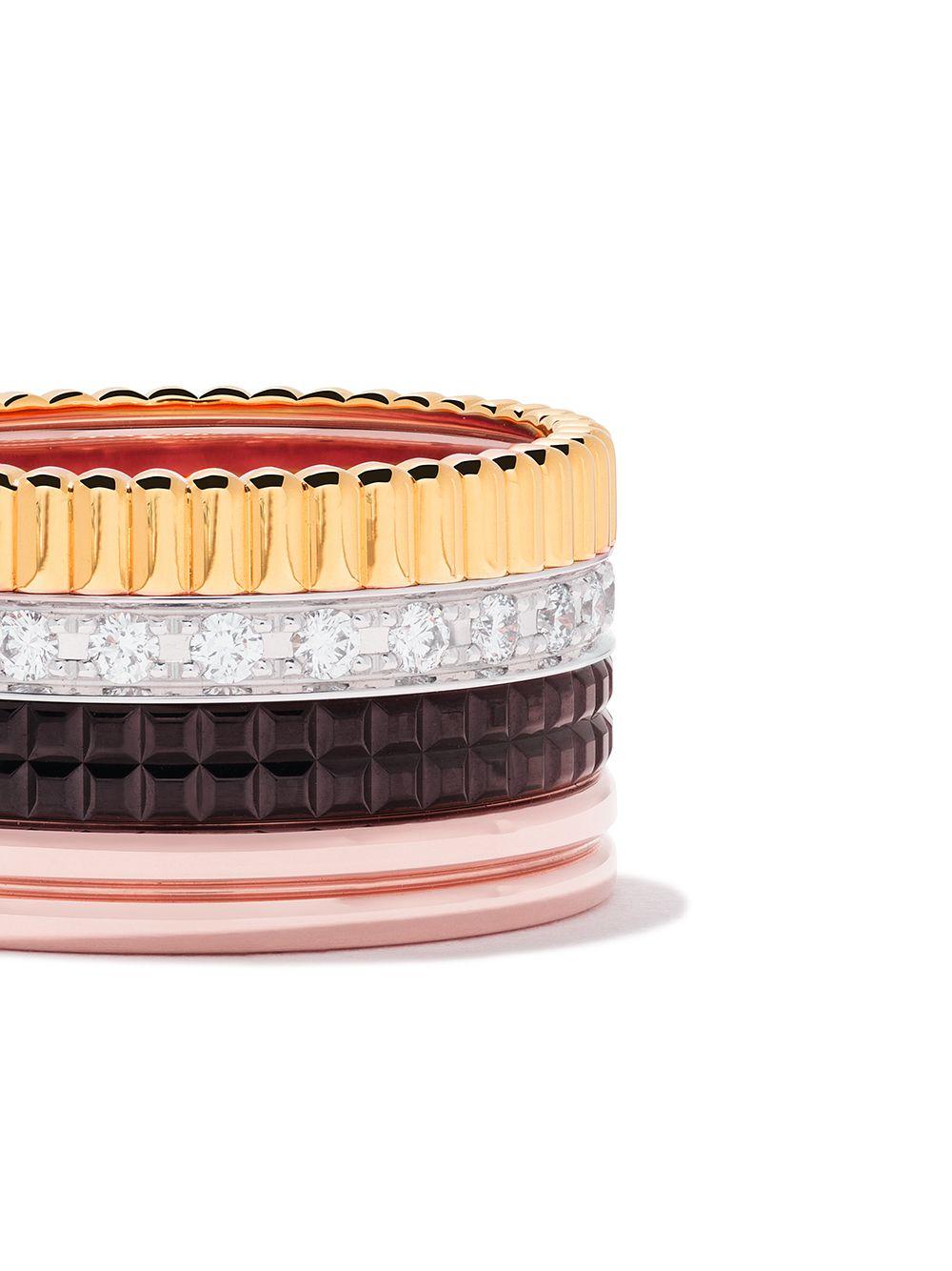 Band ring set with pavé diamonds, in yellow, white, pink gold and brown PVD.

In its original version, the Quatre ring is a genuine emblem of the Maison Boucheron. Each gold band represents one of the Maison’s codes and expresses the talent of its