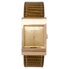 Montre Boucheron "Reflet":: or rose et bracelet en cuir