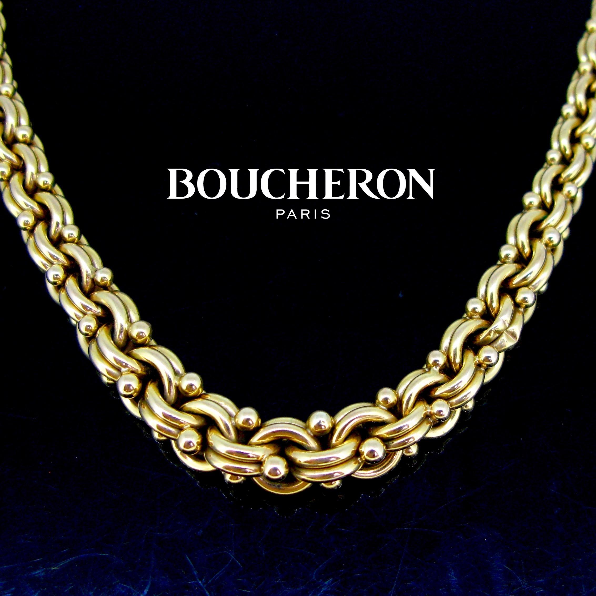 This necklace comes directly from the Retro period. It weighs 60gr and measures 16in / 40cm long. It is made in 18kt yellow gold and comprises double beaded and graduated links. The clasp is numbered signed Boucheron. It has been controlled by the