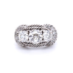 Boucheron Retro Three-Stone Diamond Ring, circa 1940s