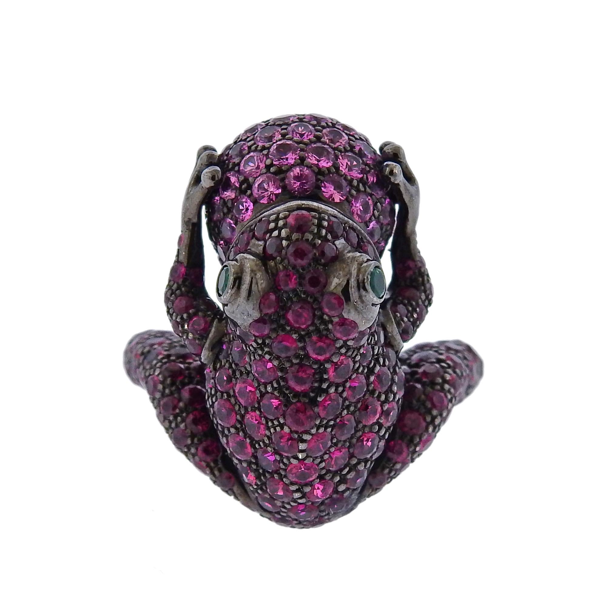 Exquisite 18k blackened white gold frog ring by Boucheron, adorned with rubies, pink sapphires and emerald eyes. Ring size - 6.5, ring top measures - 25mm x 17mm. Weight is 19.7 grams. Marked: 750,53, 544488, Boucheron, French mark. 
