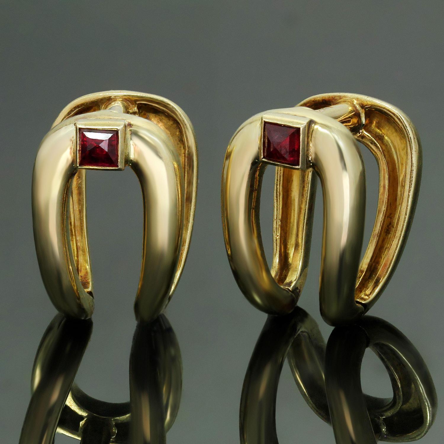 These classic retro Boucheron cufflinks are crafted in 18k yellow gold and bezel-set with French-cut square red rubies. Made in France circa 1940s. Measurements: 0.55