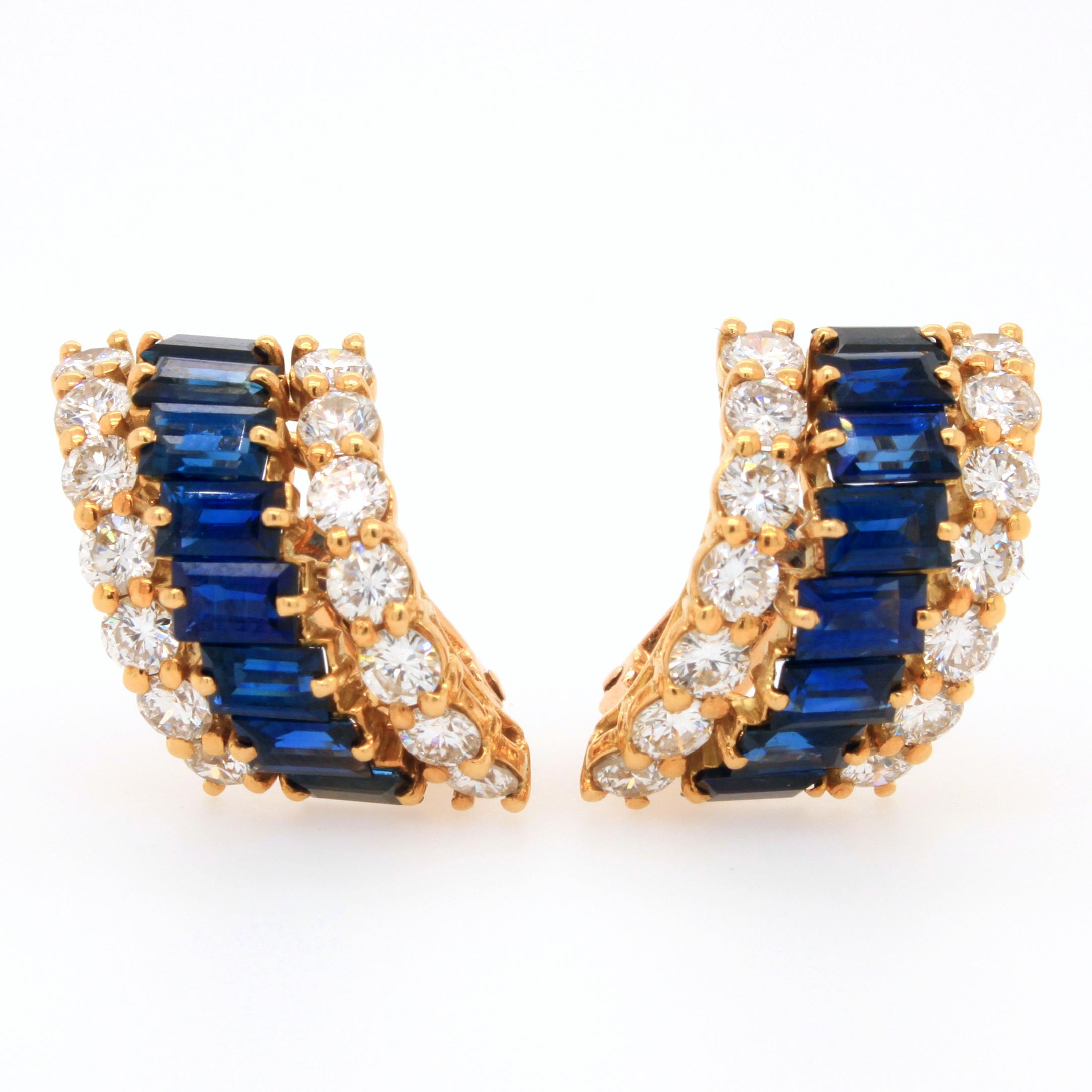 A pair of sapphire and diamond earclips mounted in yellow gold made by the famous French jeweller Boucheron.
These stylish earrings from the 70s are set with approximately 3ct circular cut diamonds (F-G/VVS) and 3ct rectangular cut sapphires.
They