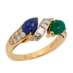 Boucheron Ring aus 18 Karat Gelbgold mit Saphir, Smaragd und Diamant